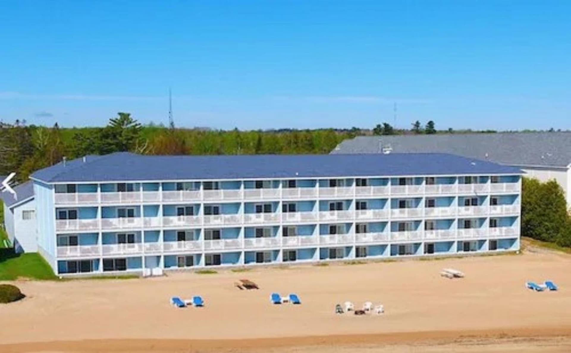 Blue Water Beachfront Hotel & Waterpark featured exterior or lobby in Mackinaw City, MI — similar hotel