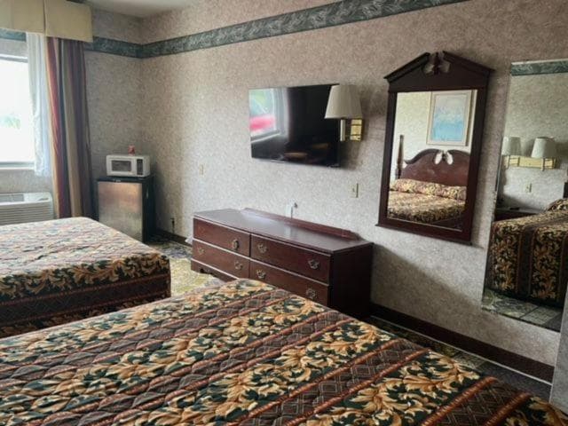 Garden Inn featured exterior or lobby in New Castle, IN — similar hotel