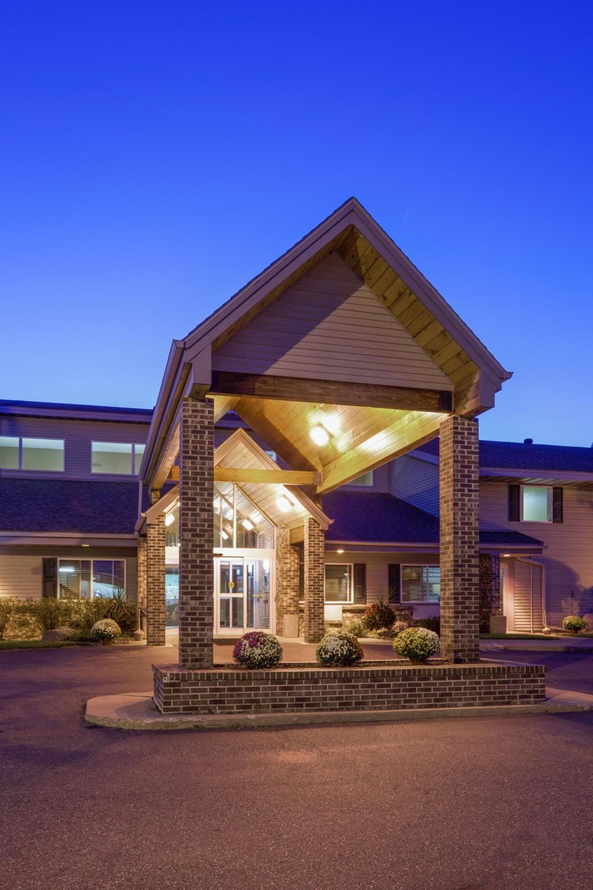 AmericInn by Wyndham Rhinelander featured exterior or lobby in Rhinelander, WI — similar hotel