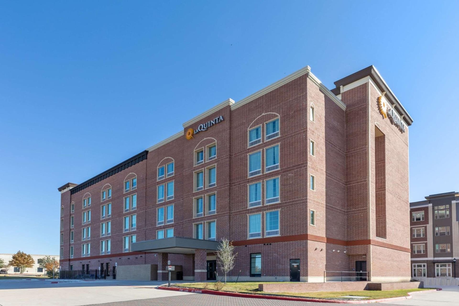 La Quinta Inn & Suites by Wyndham Dallas - Frisco Stadium exterior or lobby in Frisco, TX — main listing photo