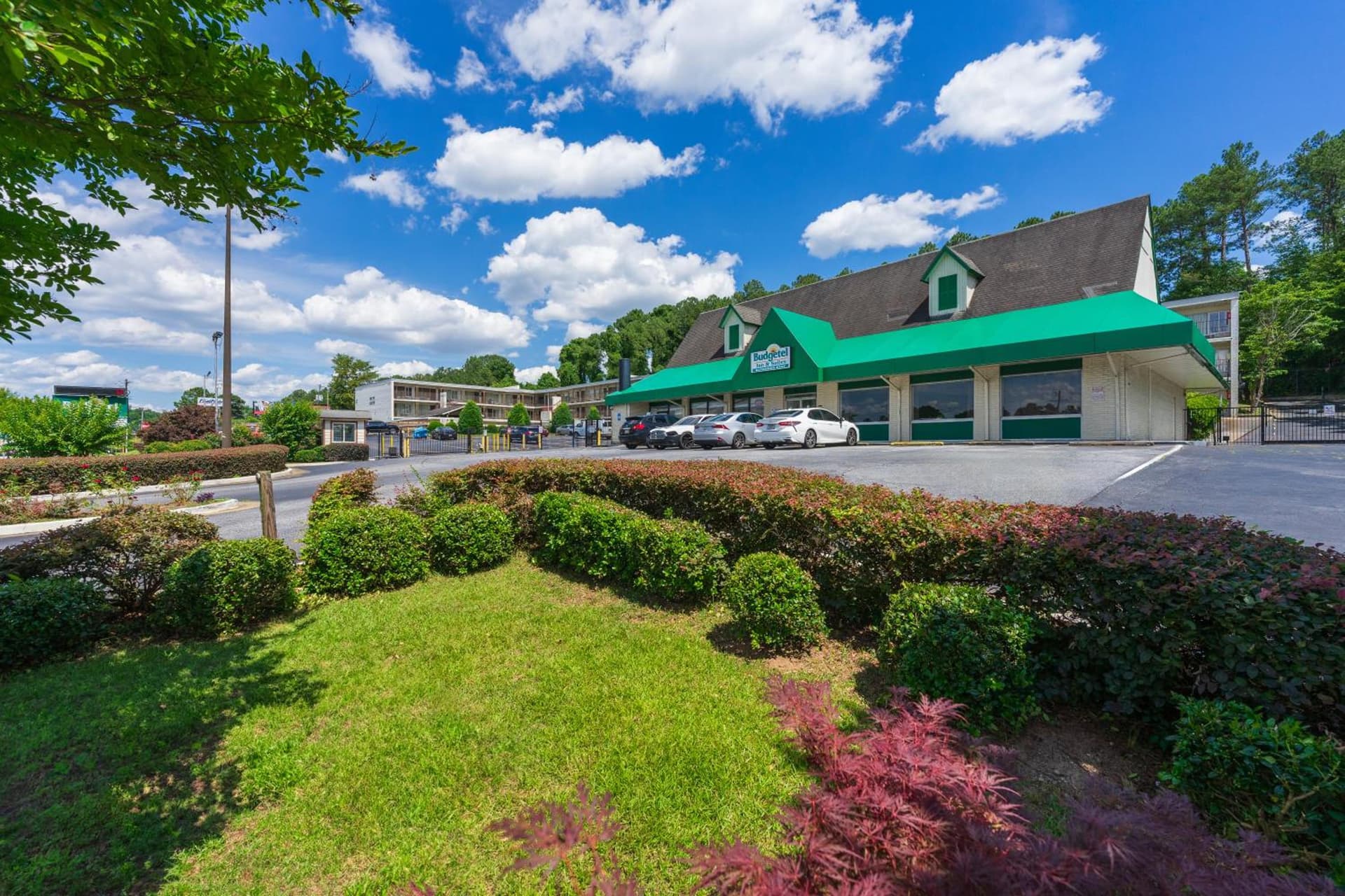 Budgetel Inn and Suites featured exterior or lobby in Atlanta, GA — similar hotel