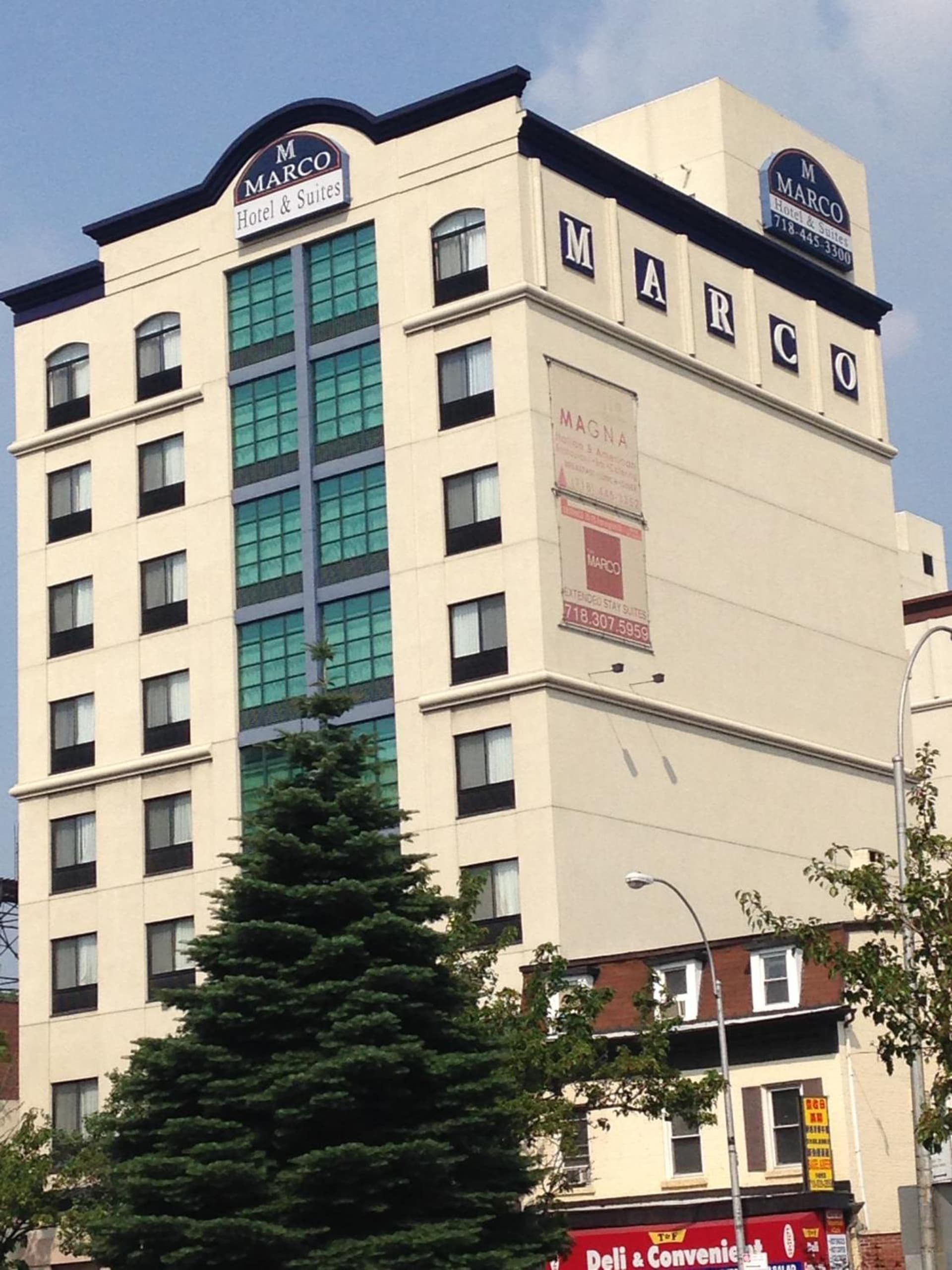 Marco LaGuardia Hotel & Suites exterior or lobby in Queens, NY — main listing photo