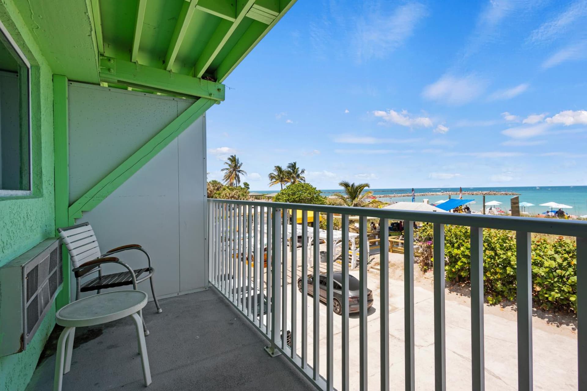 Ocean View Hotel Room with Balcony- King Bed #19 interior in Fort Pierce, FL — gallery photo 2
