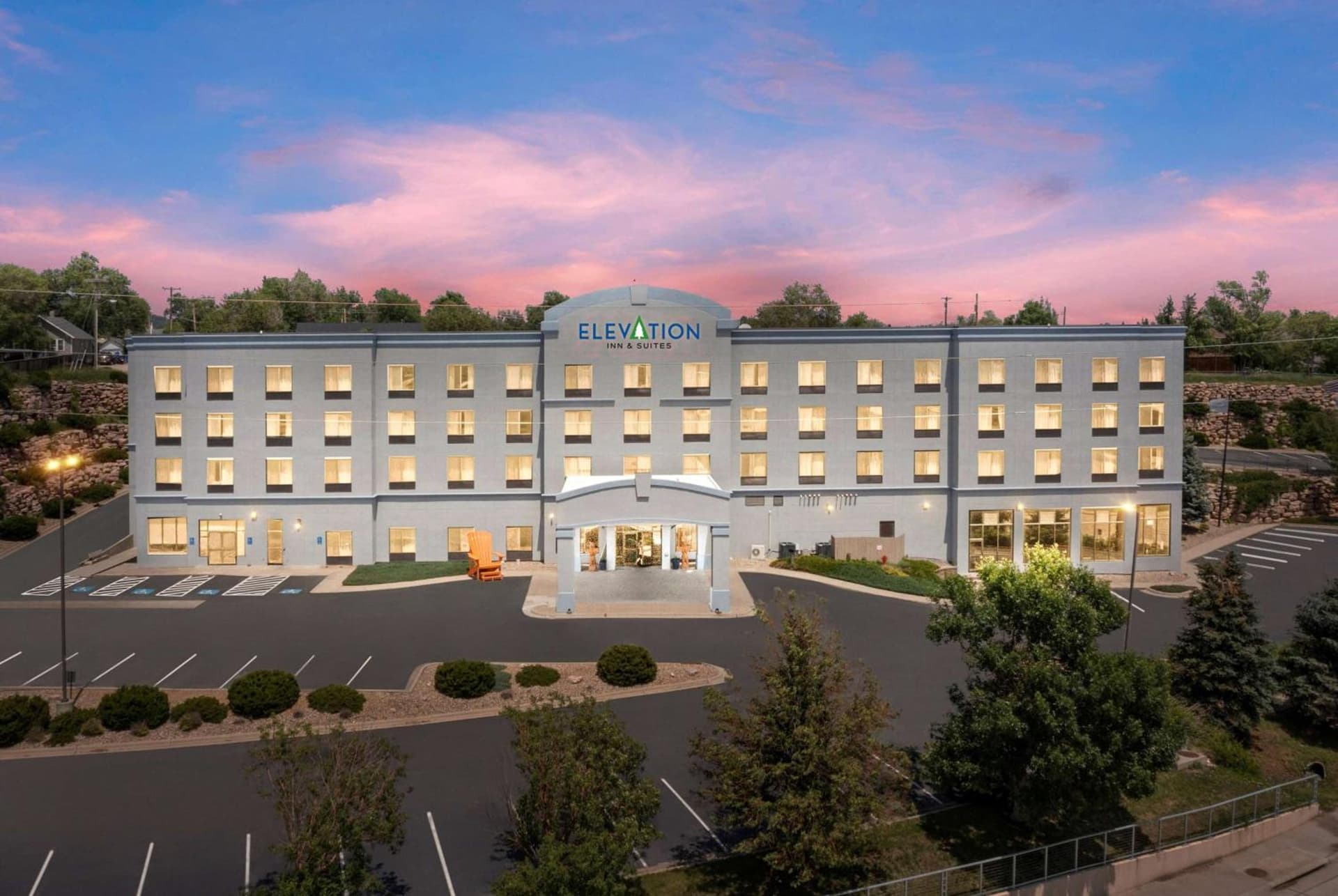 Elevation Inn & Suites, Trademark Collection by Wyndham Downtown Rapid City- Walking Distance To The Monument featured exterior or lobby in Rapid City, SD — similar hotel