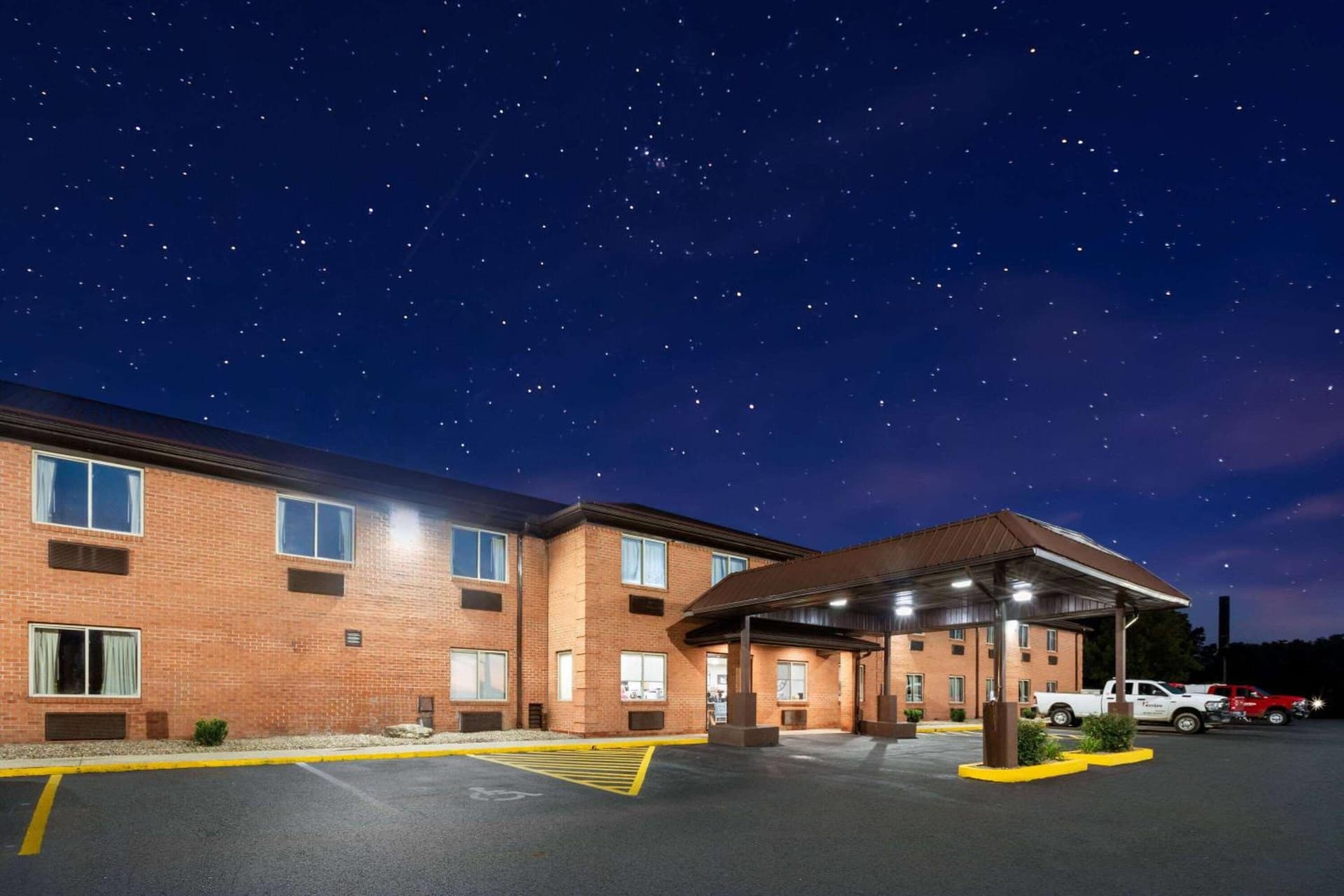 Super 8 by Wyndham Fairmont featured exterior or lobby in Fairmont, WV — similar hotel