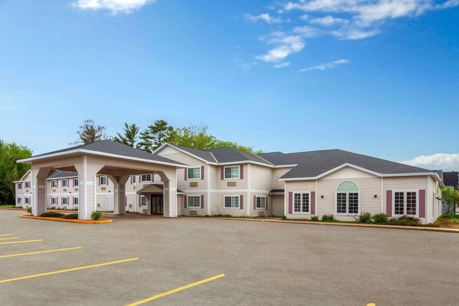 AmericInn by Wyndham Eagle River Downtown featured exterior or lobby in Eagle River, WI — similar hotel