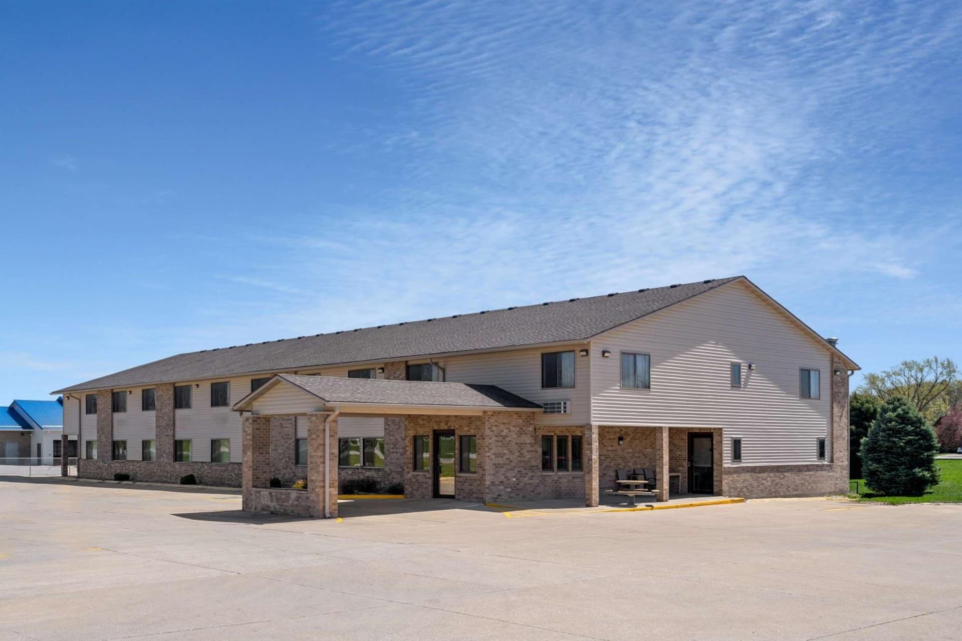 Super 8 by Wyndham Humboldt featured exterior or lobby in Humboldt, IA — similar hotel