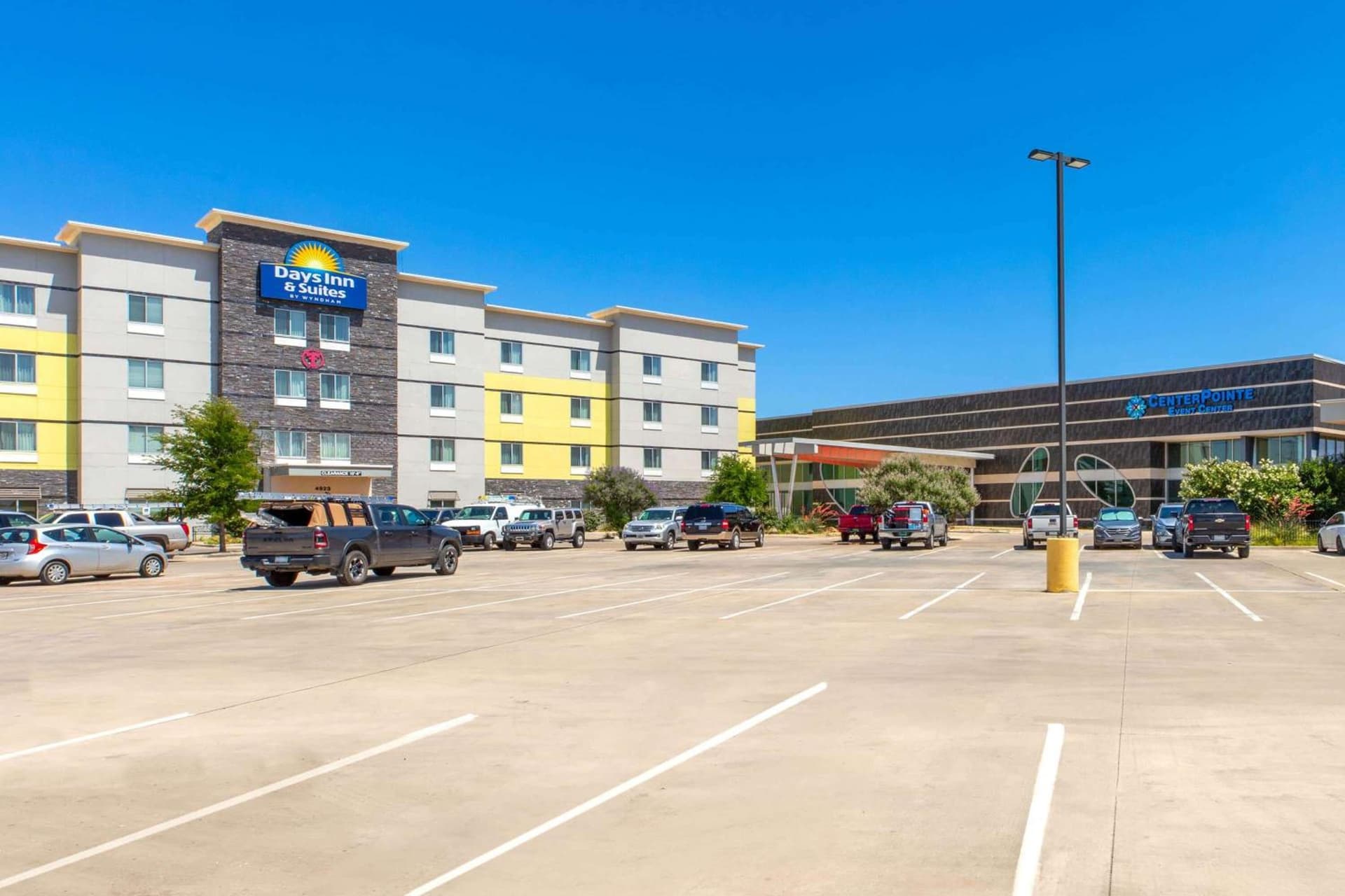 Days Inn & Suites by Wyndham Lubbock Medical Center featured exterior or lobby in Lubbock, TX — similar hotel