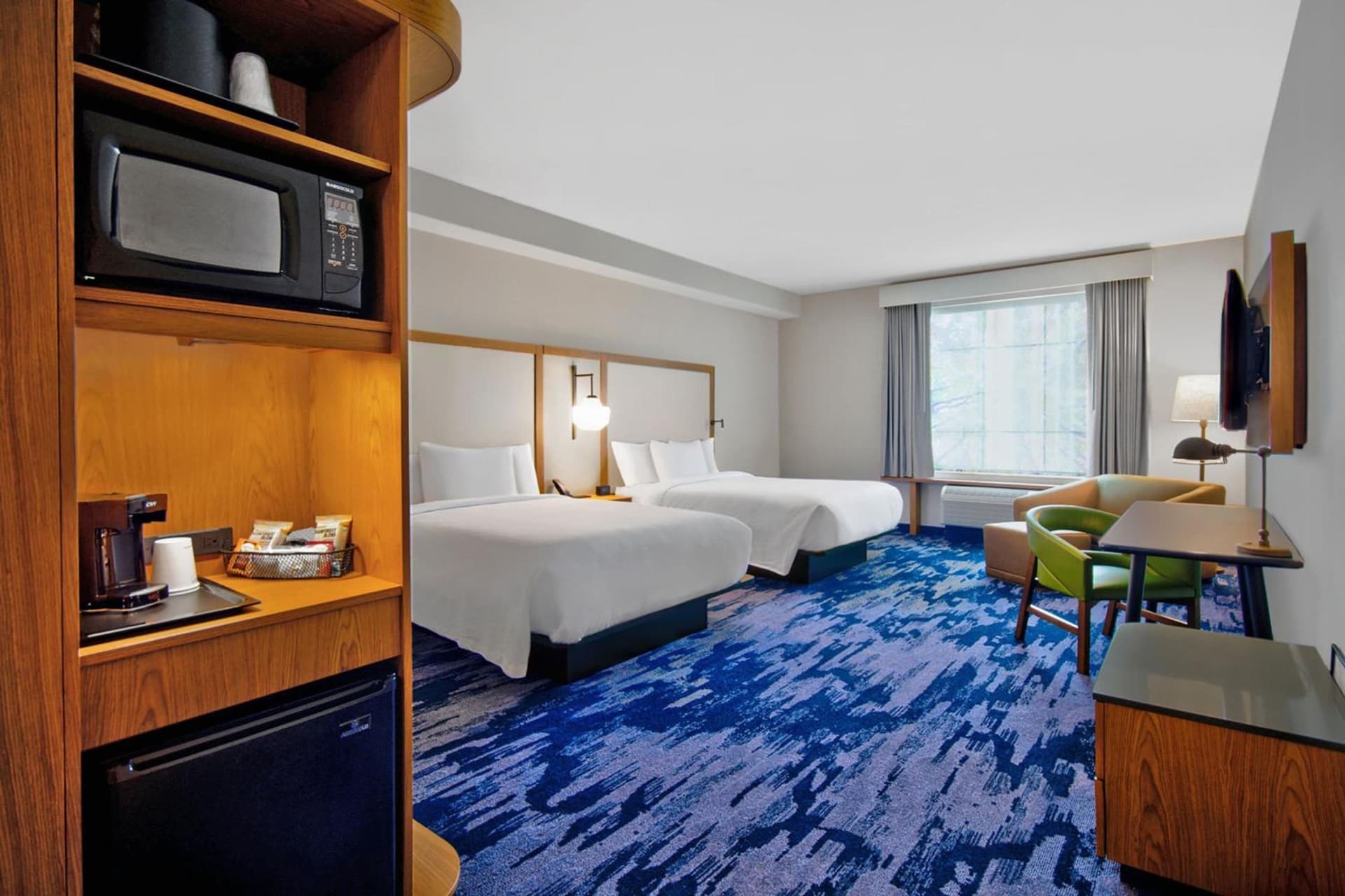 Fairfield by Marriott Inn & Suites Orlando at FLAMINGO CROSSINGS® Town Center interior in Orlando, FL — gallery photo 2