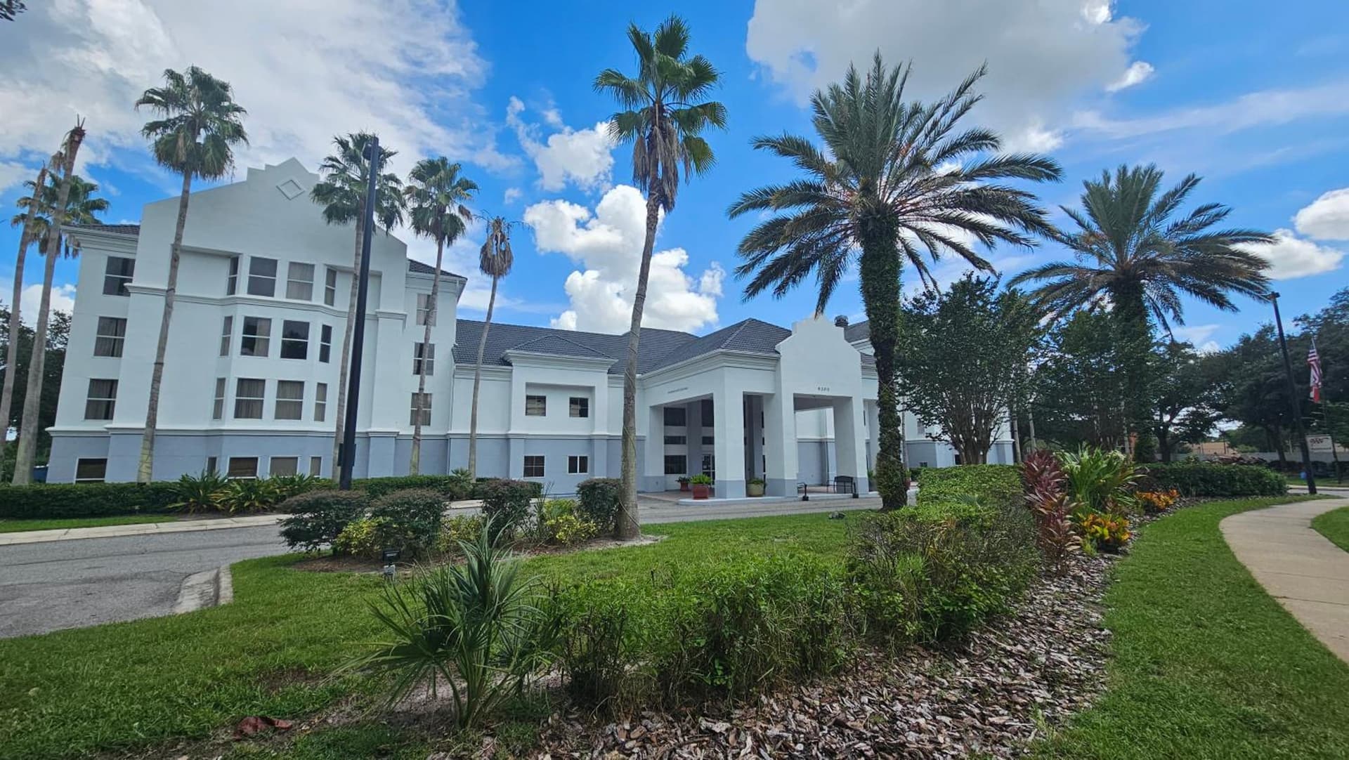 SureStay Plus by Best Western Orlando Lake Buena Vista featured exterior or lobby in Orlando, FL — similar hotel