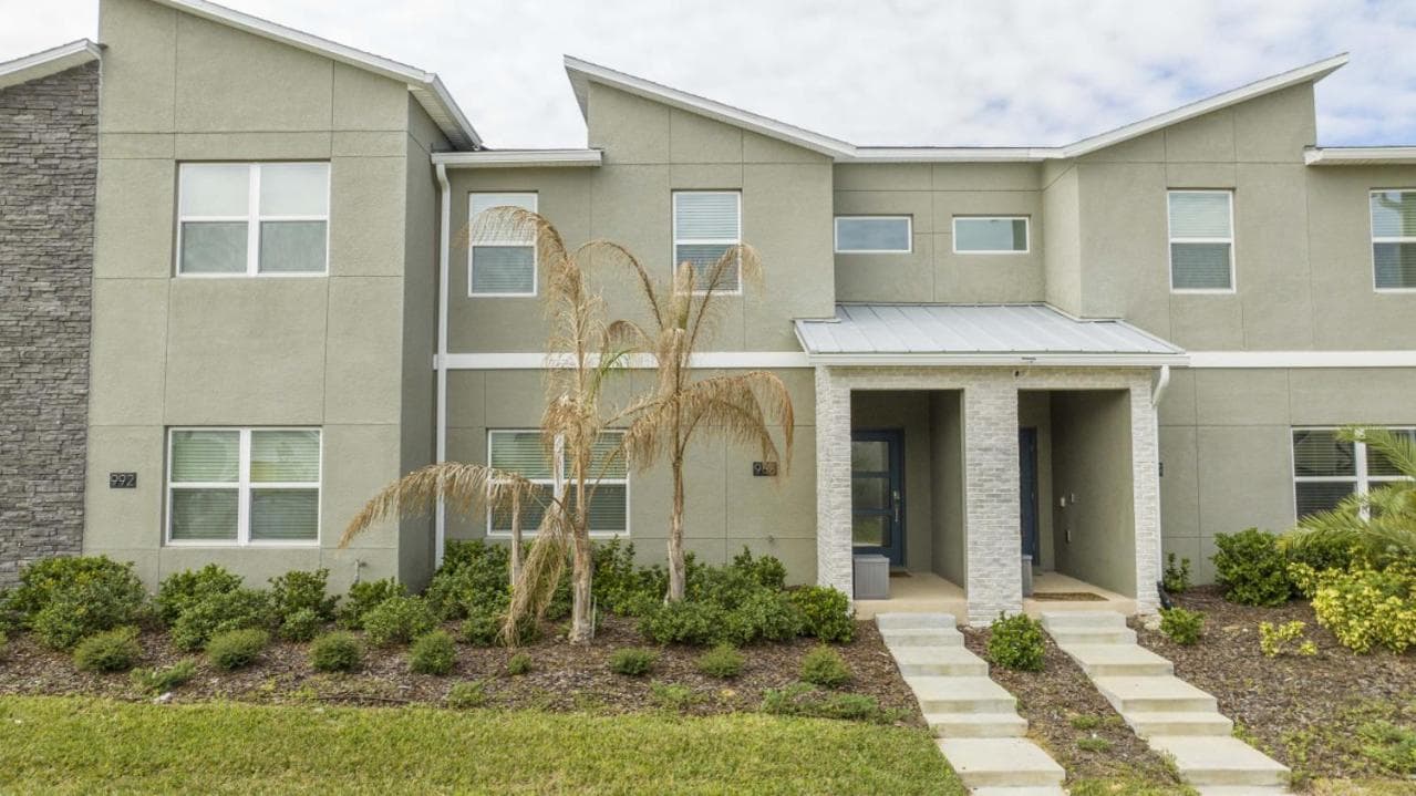 4-bedroom Townhome Resort with BBQ Grill and Pool featured exterior or lobby in Kissimmee, FL — similar hotel