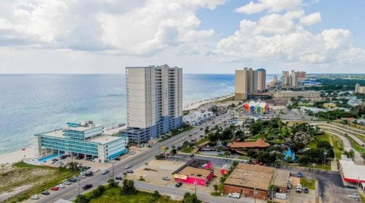 Oceanfront BEACH! CONDO COUPLES GETAWAY,HONEYMOON SWEET, Perfectly Cozy Beach Front Condo, full kitchen, pool, free parking,CHECK-IN AT DOOR You will LOVE  featured exterior or lobby in Panama City Beach, FL — similar hotel