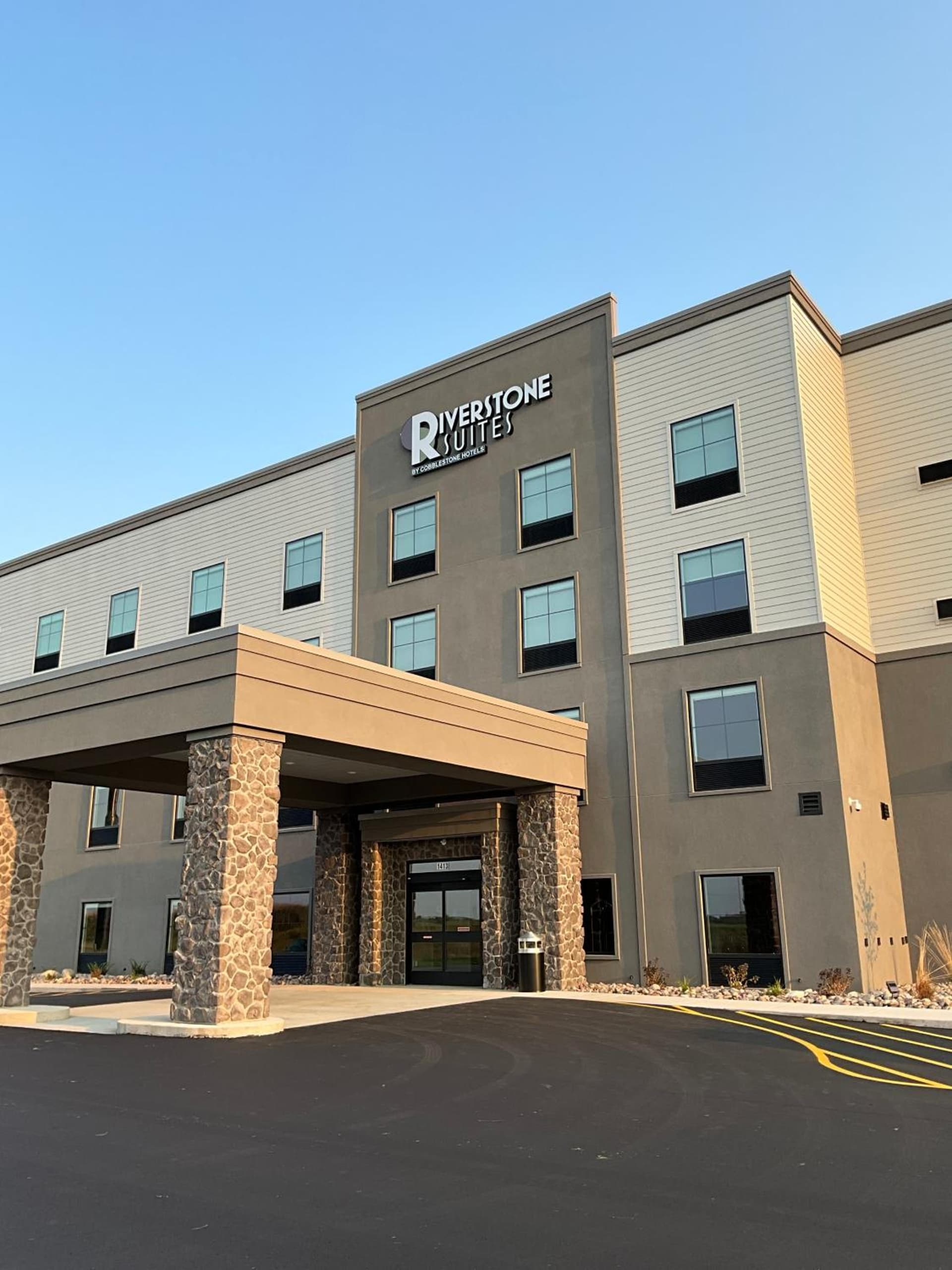Riverstone Suites by Cobblestone Hotels - Chippewa Falls featured exterior or lobby in Chippewa Falls, WI — similar hotel