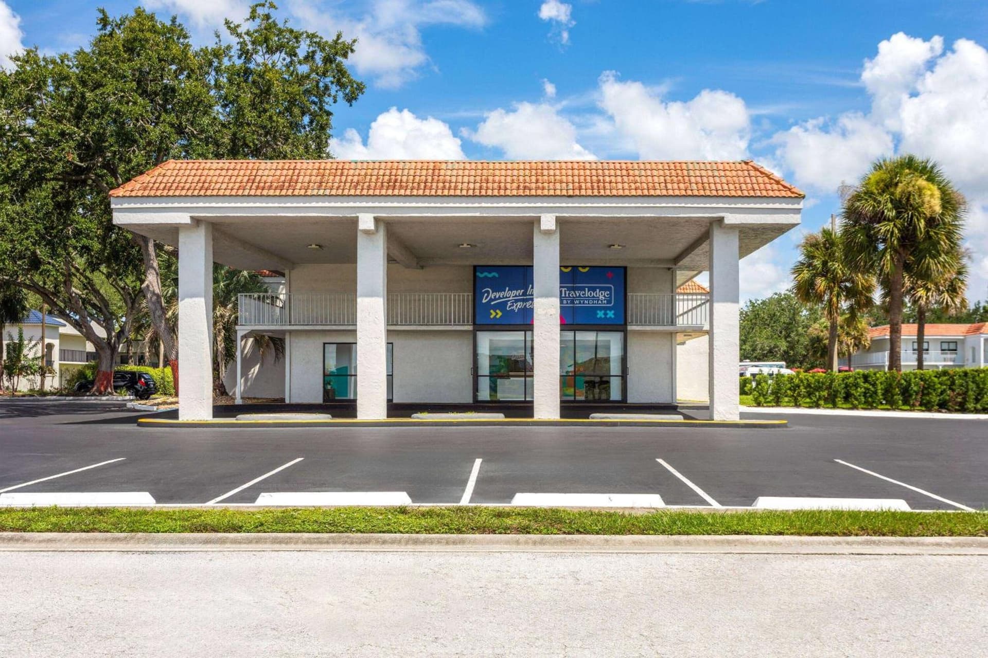 Travelodge by Wyndham Orlando Lake Buena Vista South exterior or lobby in Kissimmee, FL — main listing photo
