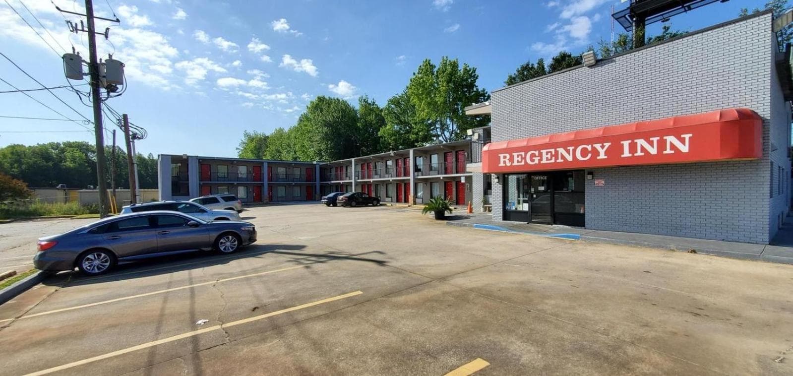 Regency Inn featured exterior or lobby in Riverdale, GA — similar hotel