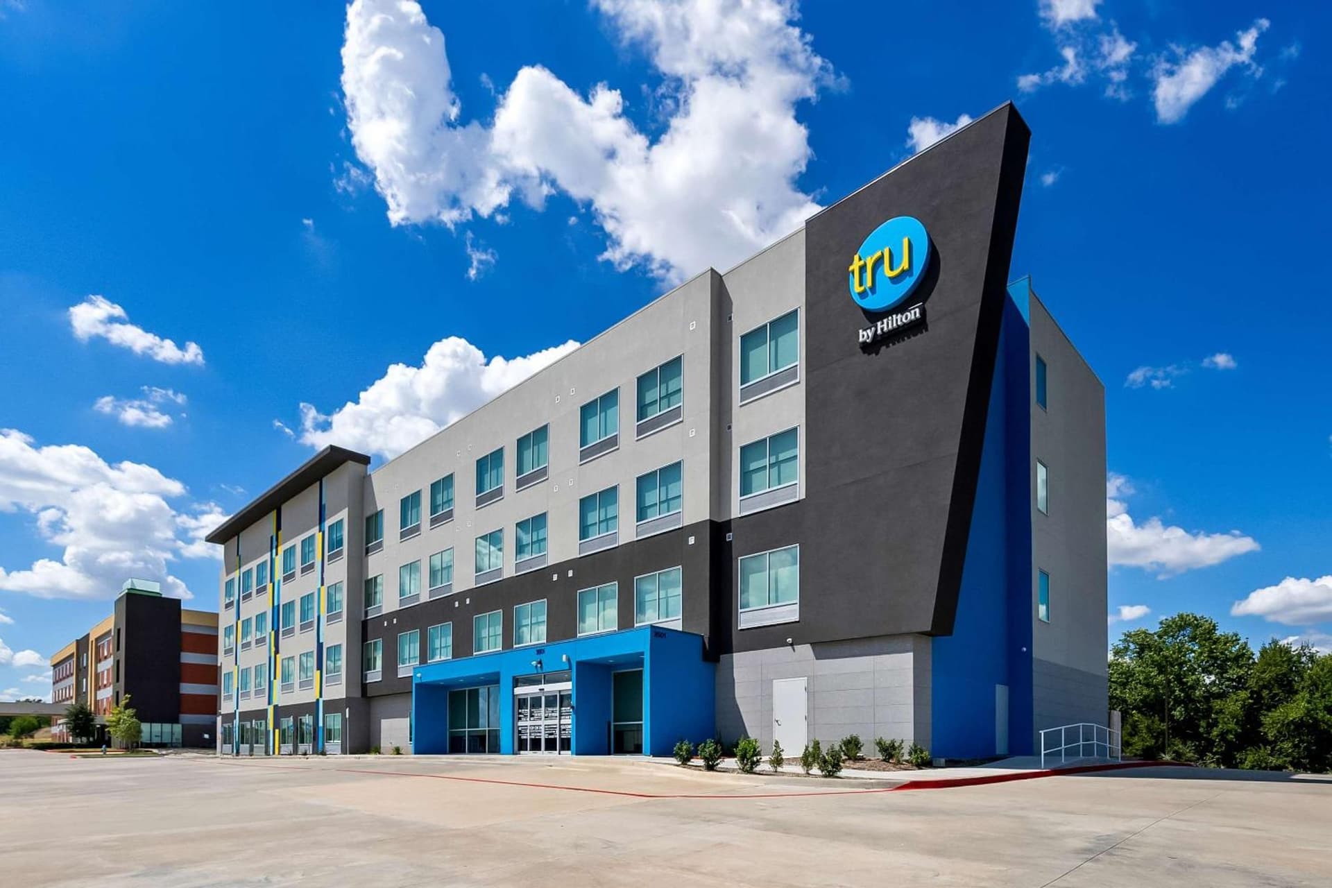 Tru by Hilton Plano Hwy 75 featured exterior or lobby in Plano, TX — similar hotel