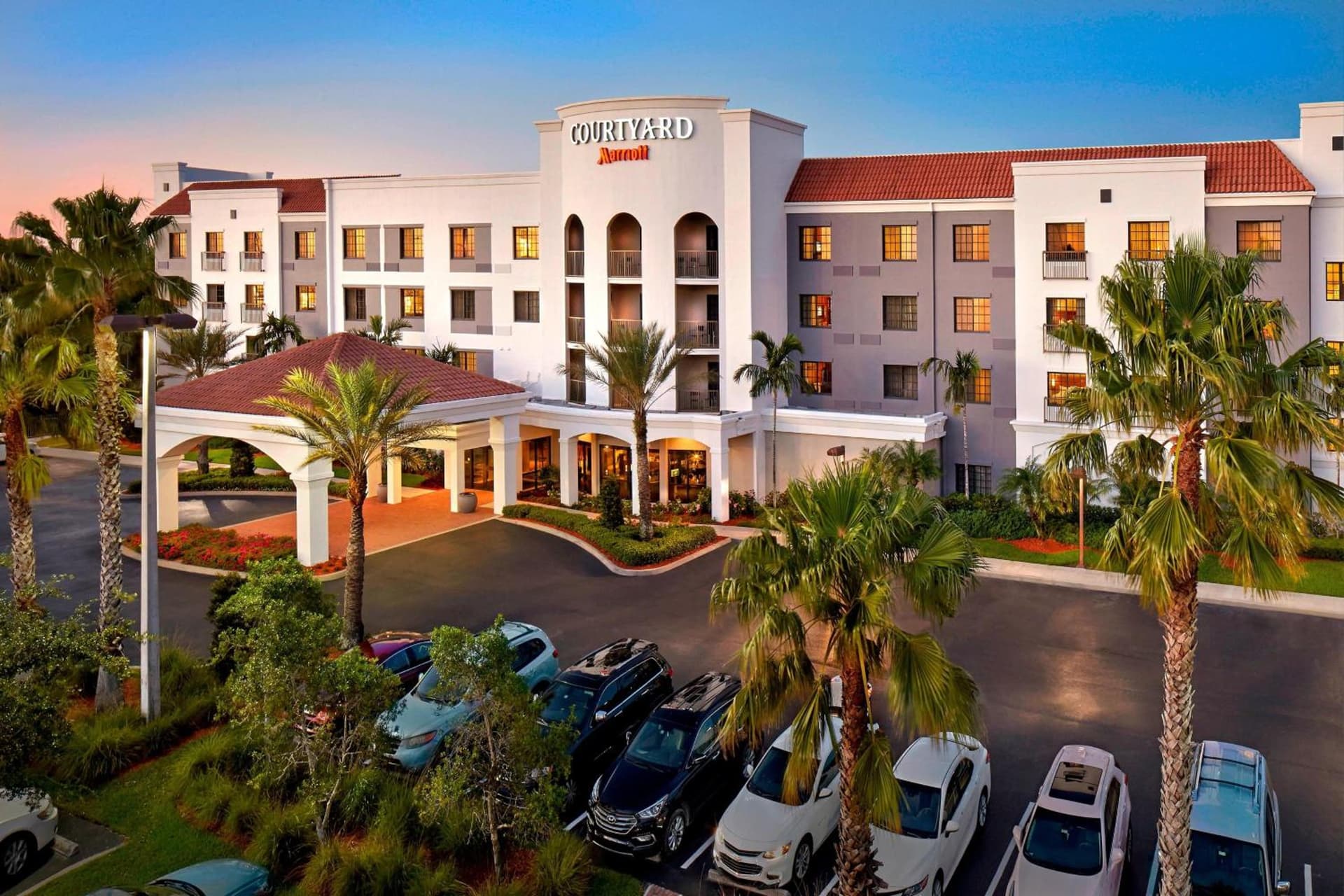 Courtyard by Marriott Stuart featured exterior or lobby in Stuart, FL — similar hotel