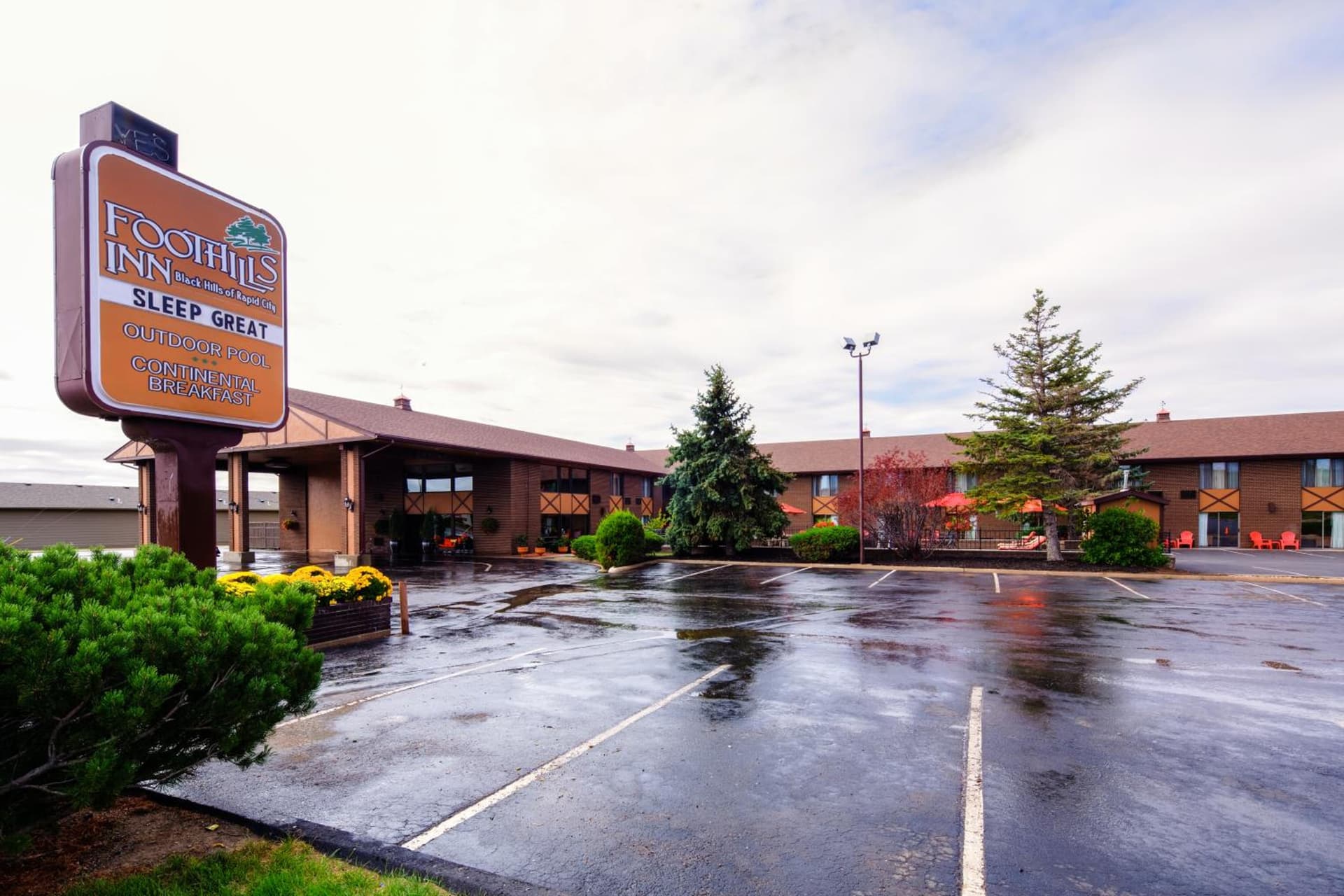 The Foothills Inn featured exterior or lobby in Rapid City, SD — similar hotel