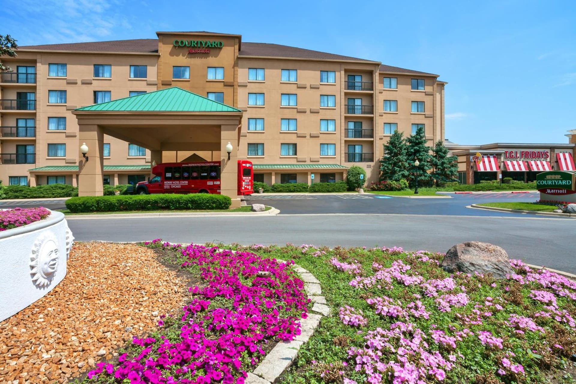 Courtyard Chicago Midway Airport featured exterior or lobby in Bedford Park, IL — similar hotel