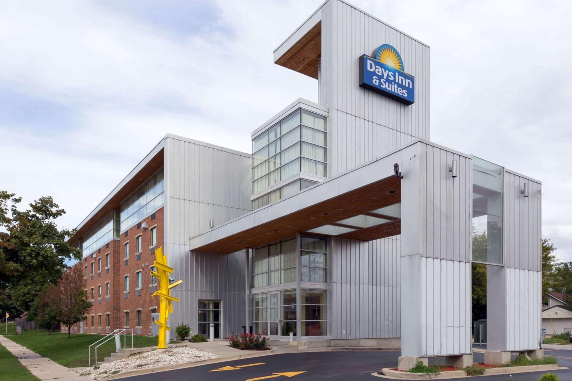 Days Inn & Suites by Wyndham Milwaukee featured exterior or lobby in Milwaukee, WI — similar hotel