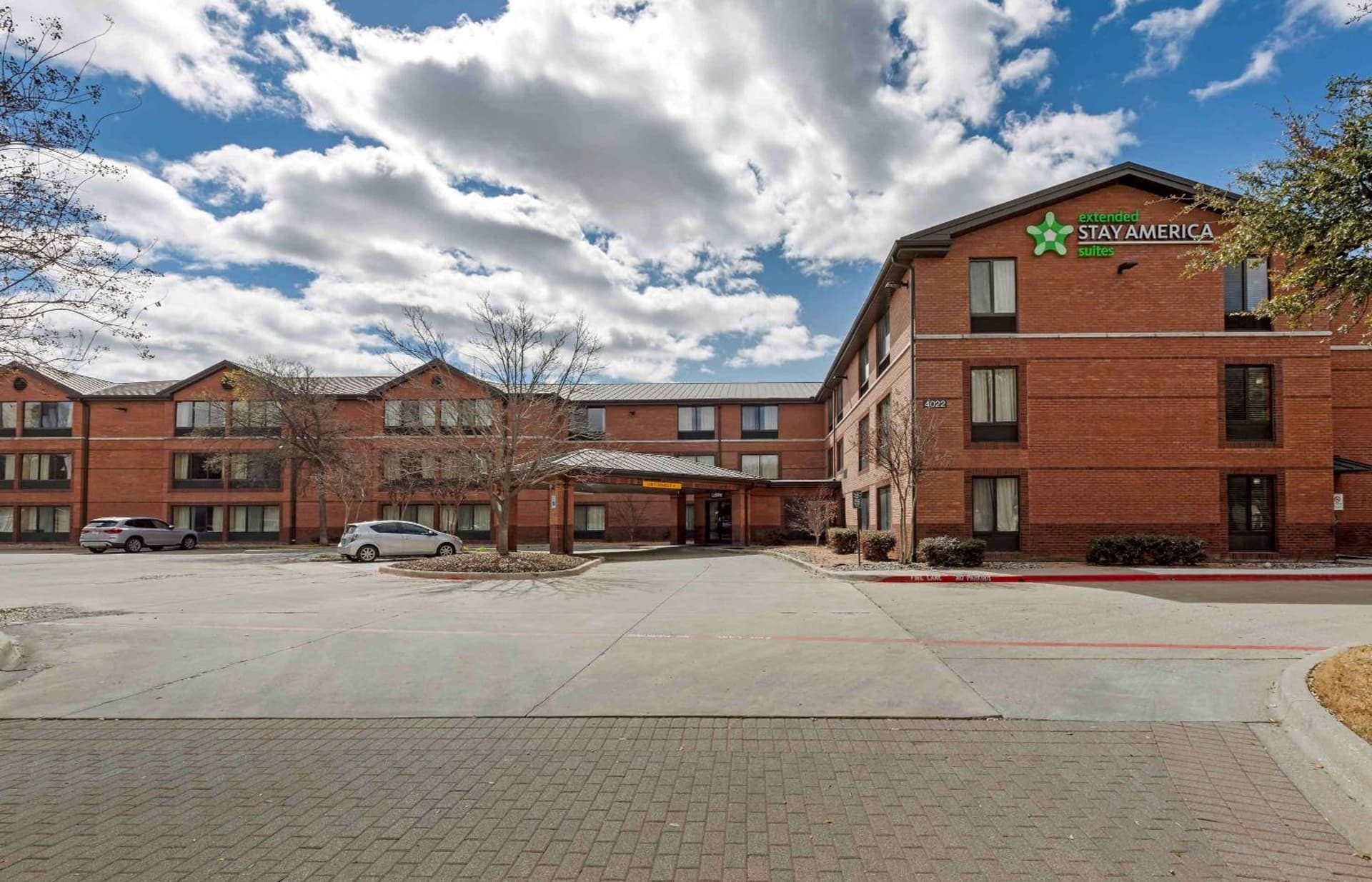 Extended Stay America Select Suites - Dallas - Farmers Branch featured exterior or lobby in Farmers Branch, TX — similar hotel