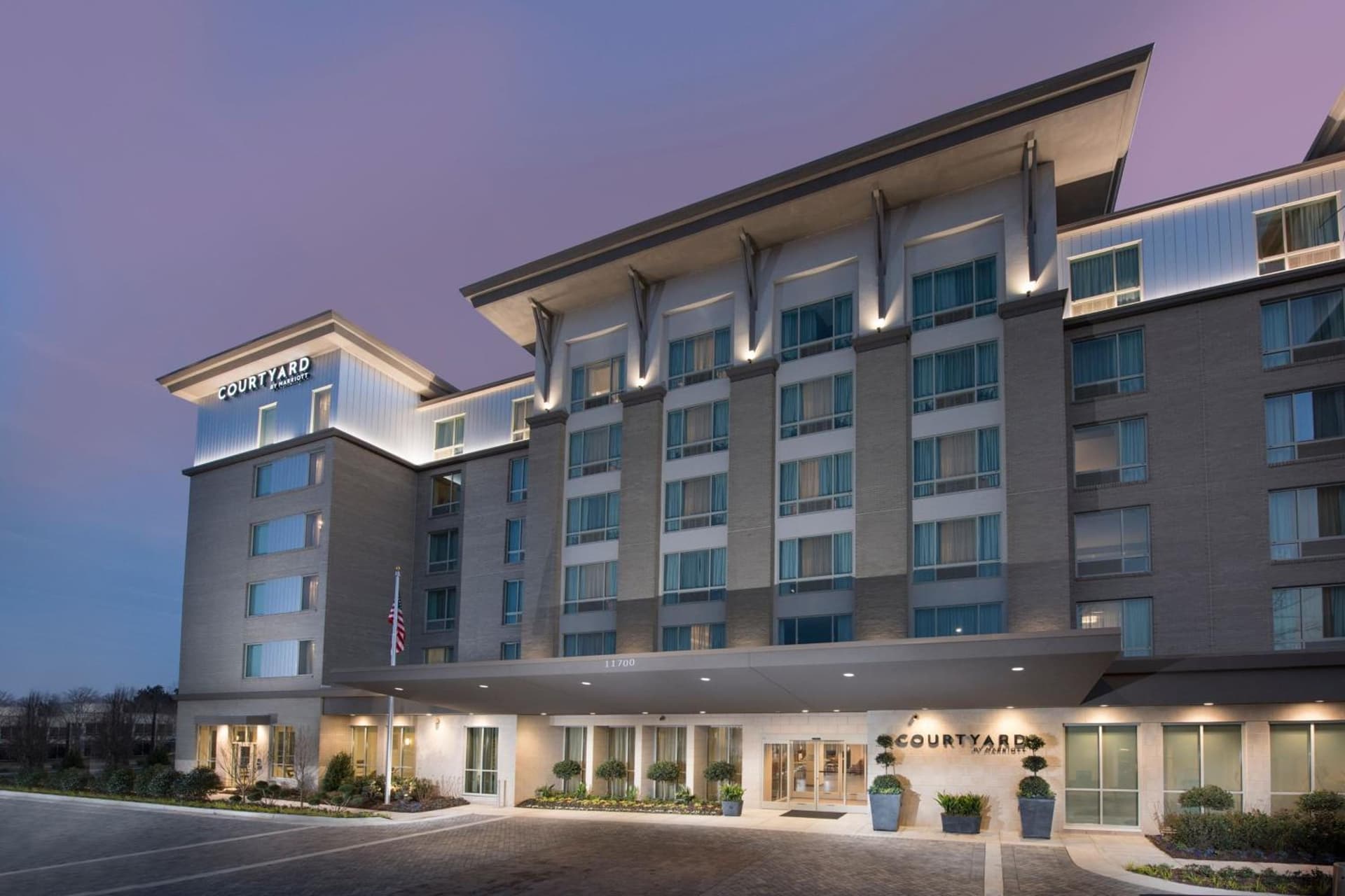 Courtyard by Marriott Atlanta Alpharetta/Avalon Area featured exterior or lobby in Alpharetta, GA — similar hotel