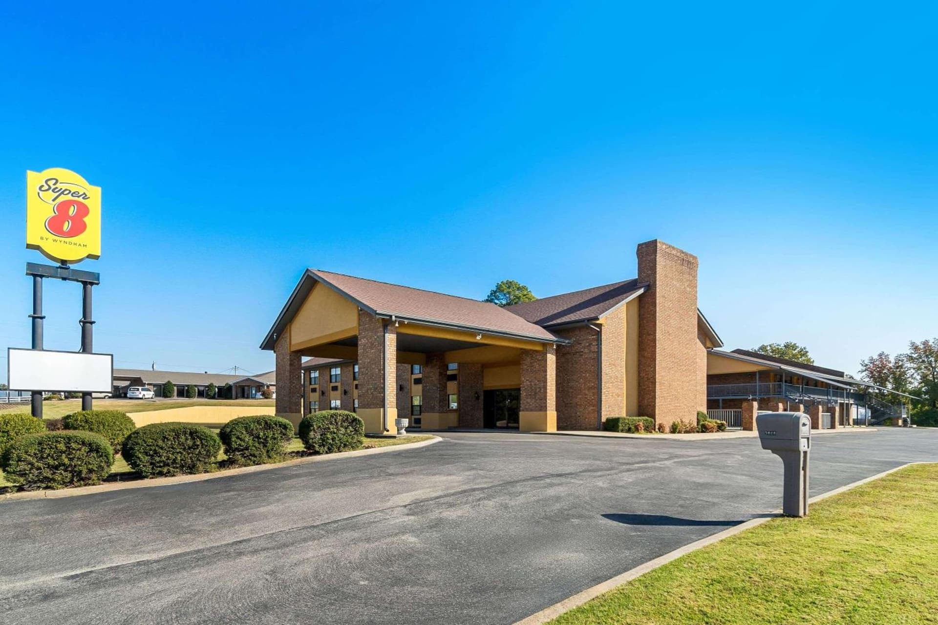 Super 8 by Wyndham Paragould featured exterior or lobby in Paragould, AR — similar hotel