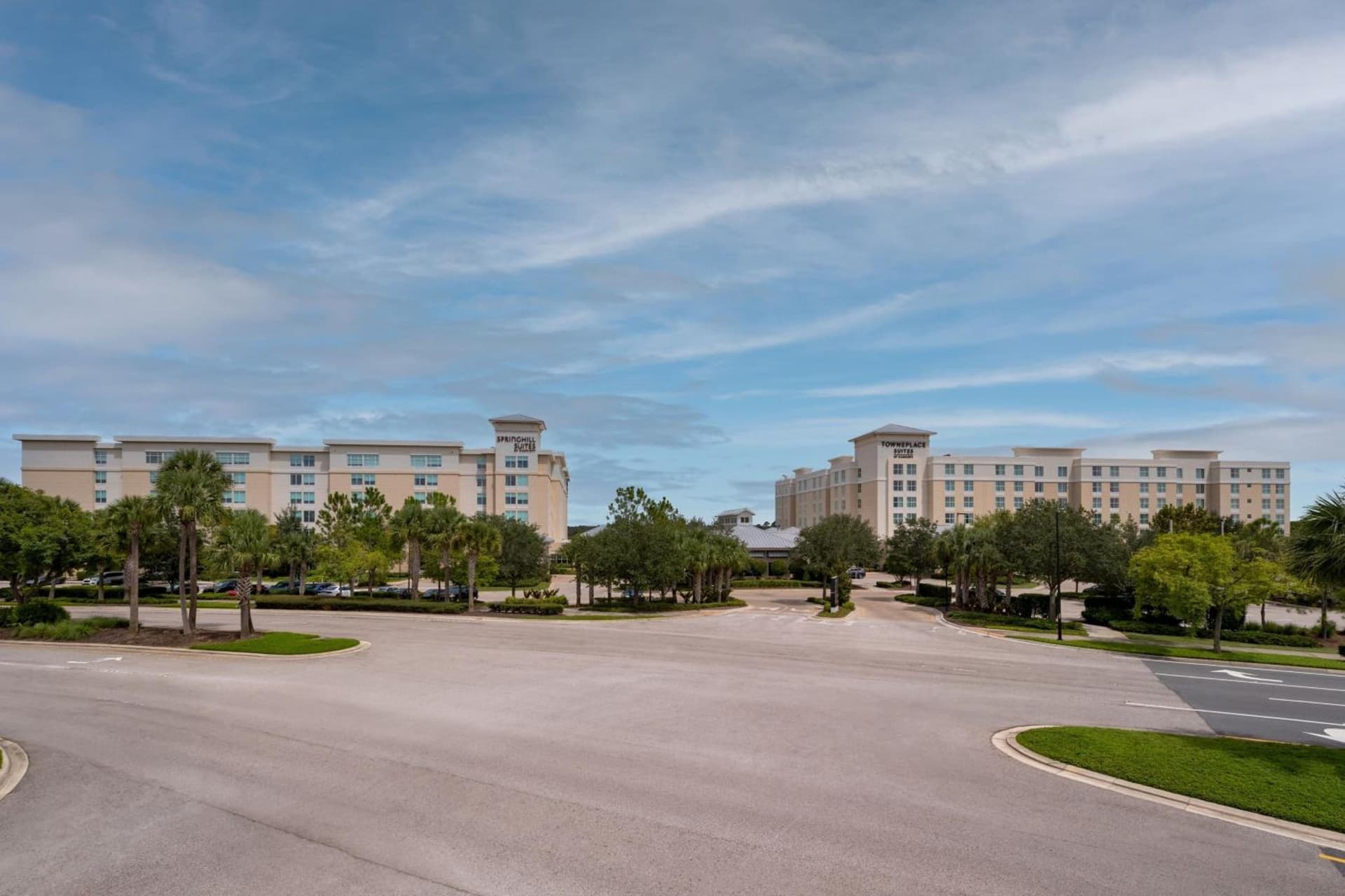 TownePlace Suites Orlando at FLAMINGO CROSSINGS Town Center, Western Entrance featured exterior or lobby in Orlando, FL — similar hotel
