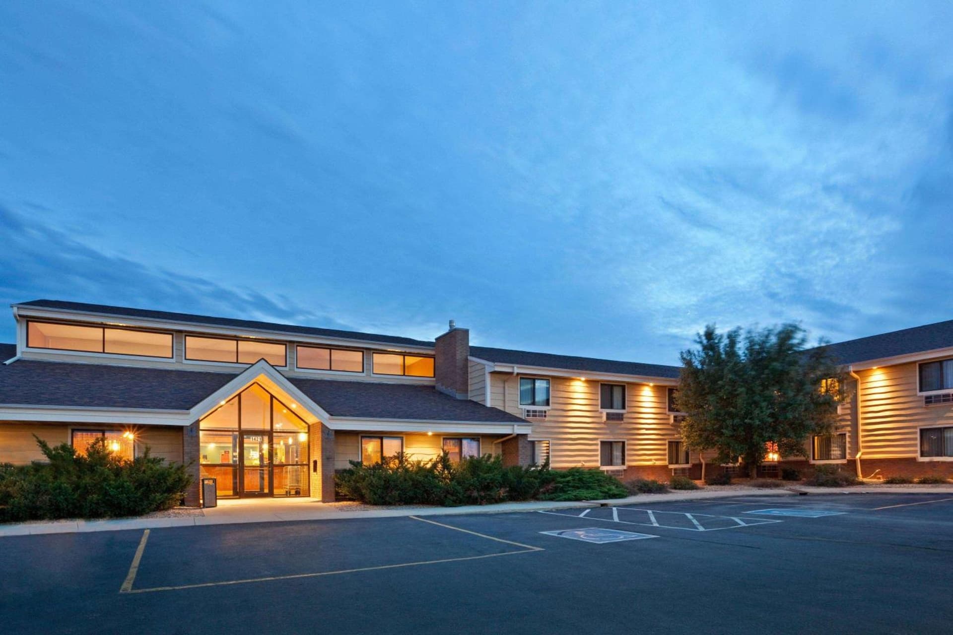 AmericInn by Wyndham Mitchell featured exterior or lobby in Mitchell, SD — similar hotel