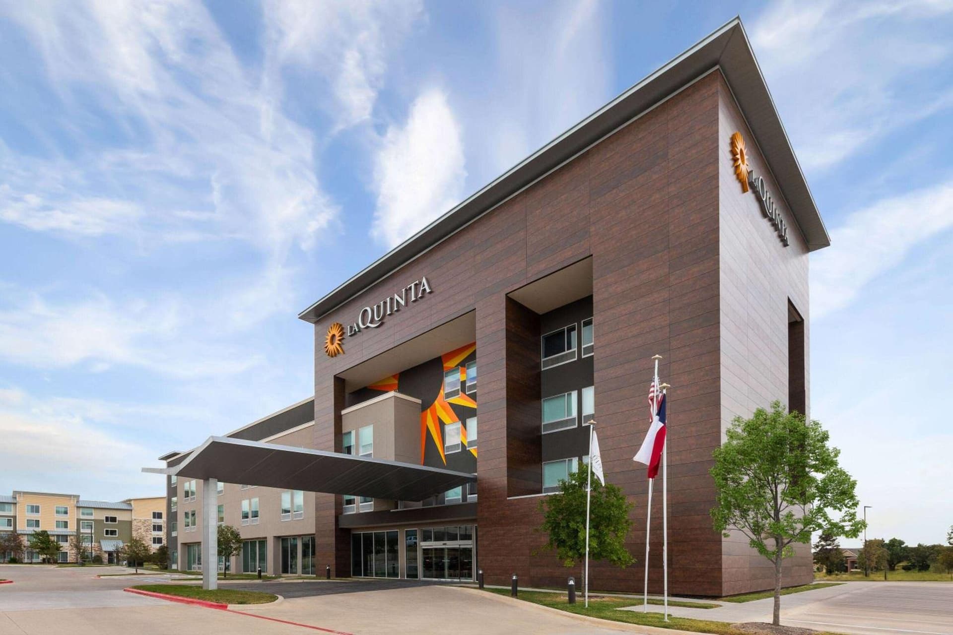 La Quinta Inn & Suites by Wyndham Austin Parmer Tech Ridge featured exterior or lobby in Austin, TX — similar hotel