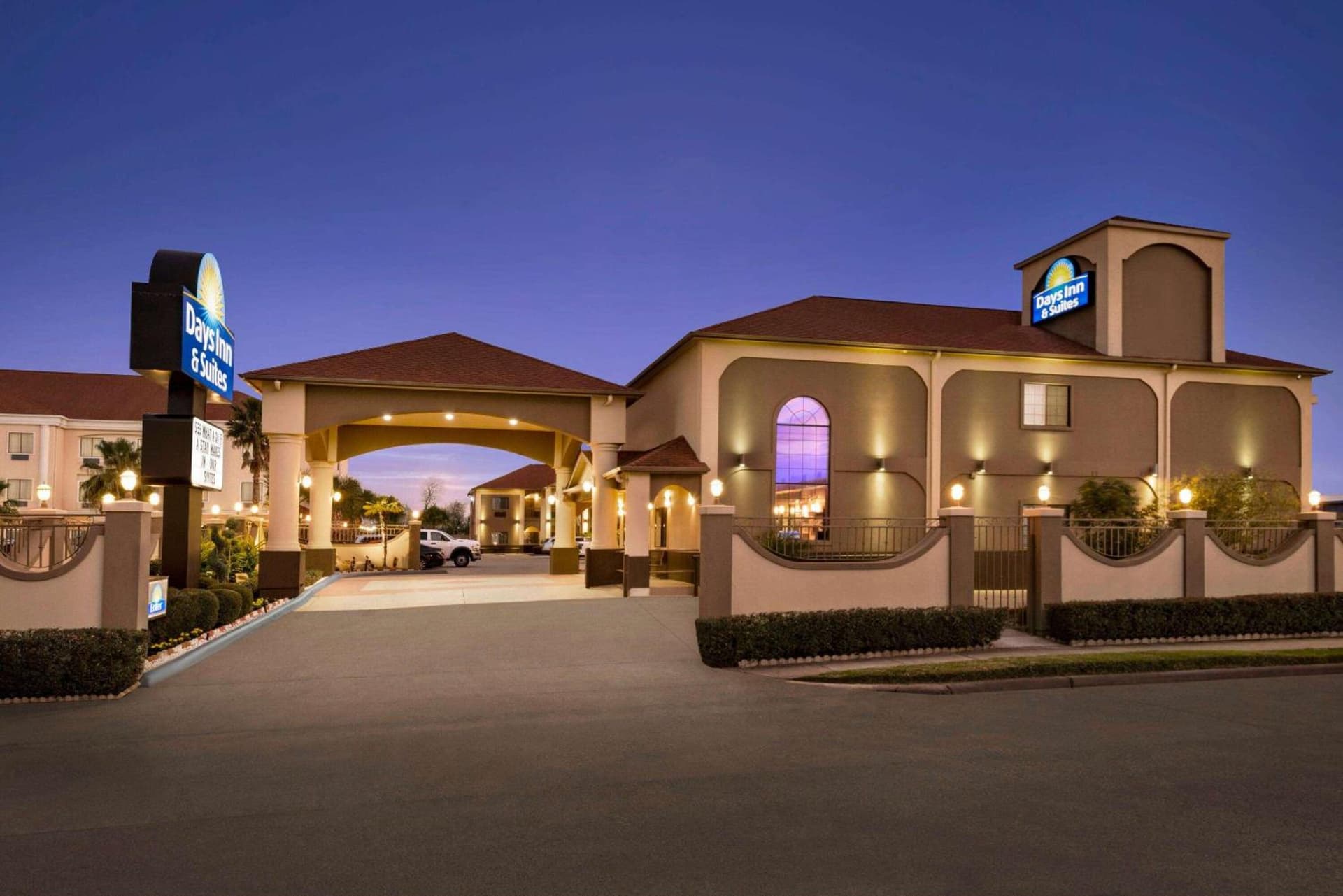 Days Inn & Suites by Wyndham Houston Hobby Airport featured exterior or lobby in Houston, TX — similar hotel