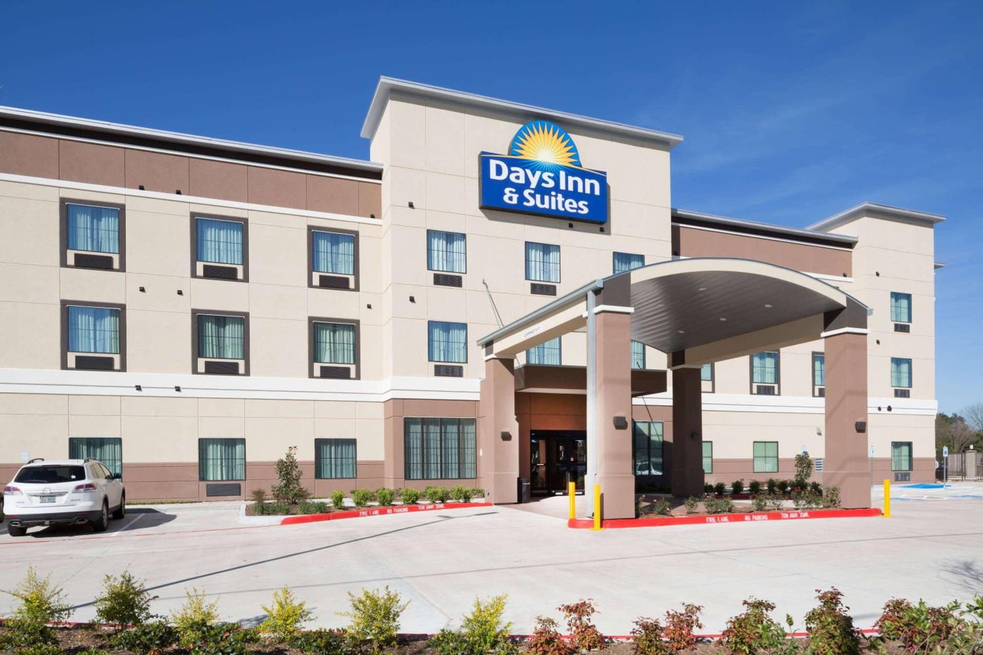 Days Inn & Suites by Wyndham Houston NW Cypress featured exterior or lobby in Cypress, TX — similar hotel