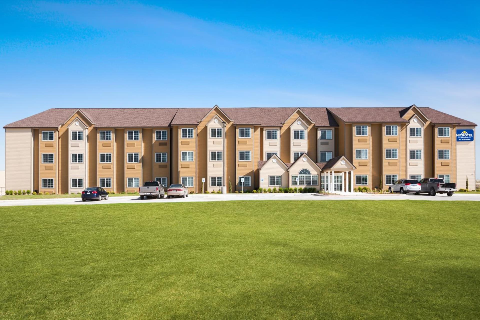 Microtel Inn & Suites Pleasanton featured exterior or lobby in Pleasanton, TX — similar hotel