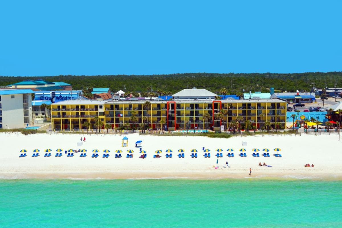 Ramada by Wyndham Panama City Beach / Beachfront featured exterior or lobby in Panama City Beach, FL — similar hotel