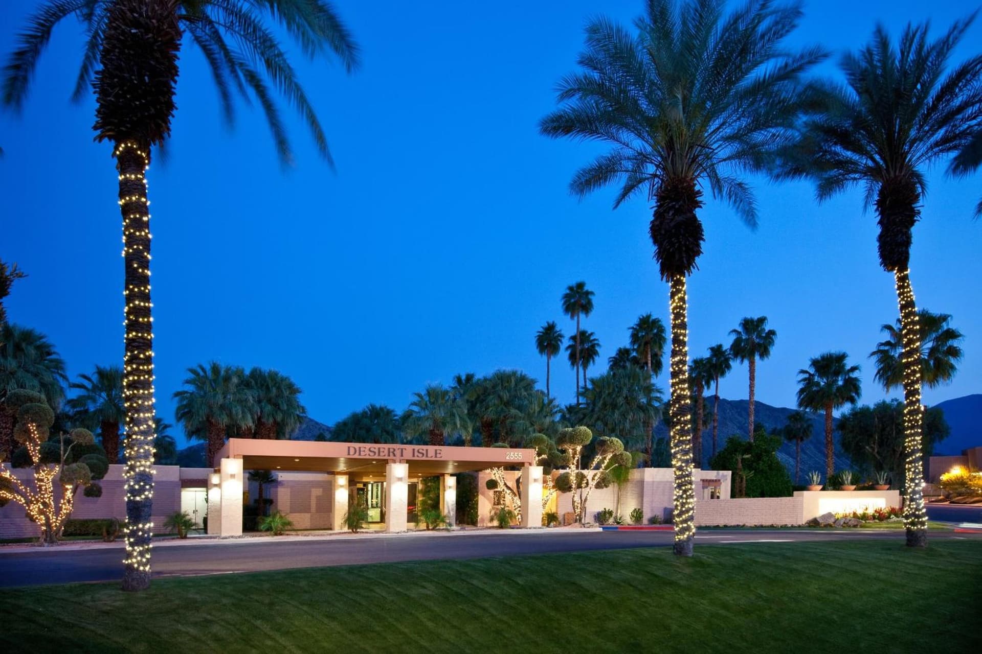 Desert Isle Resort, a VRI resort featured exterior or lobby in Palm Springs, CA — similar hotel