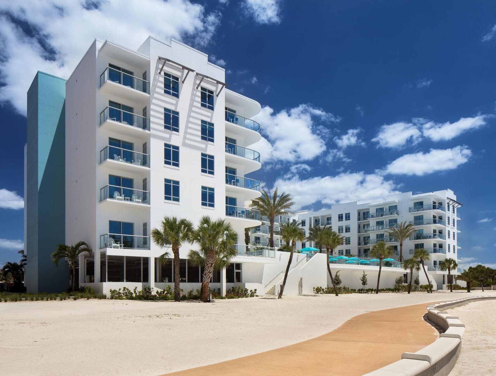 Treasure Island Beach Resort exterior or lobby in St Pete Beach, FL — main listing photo
