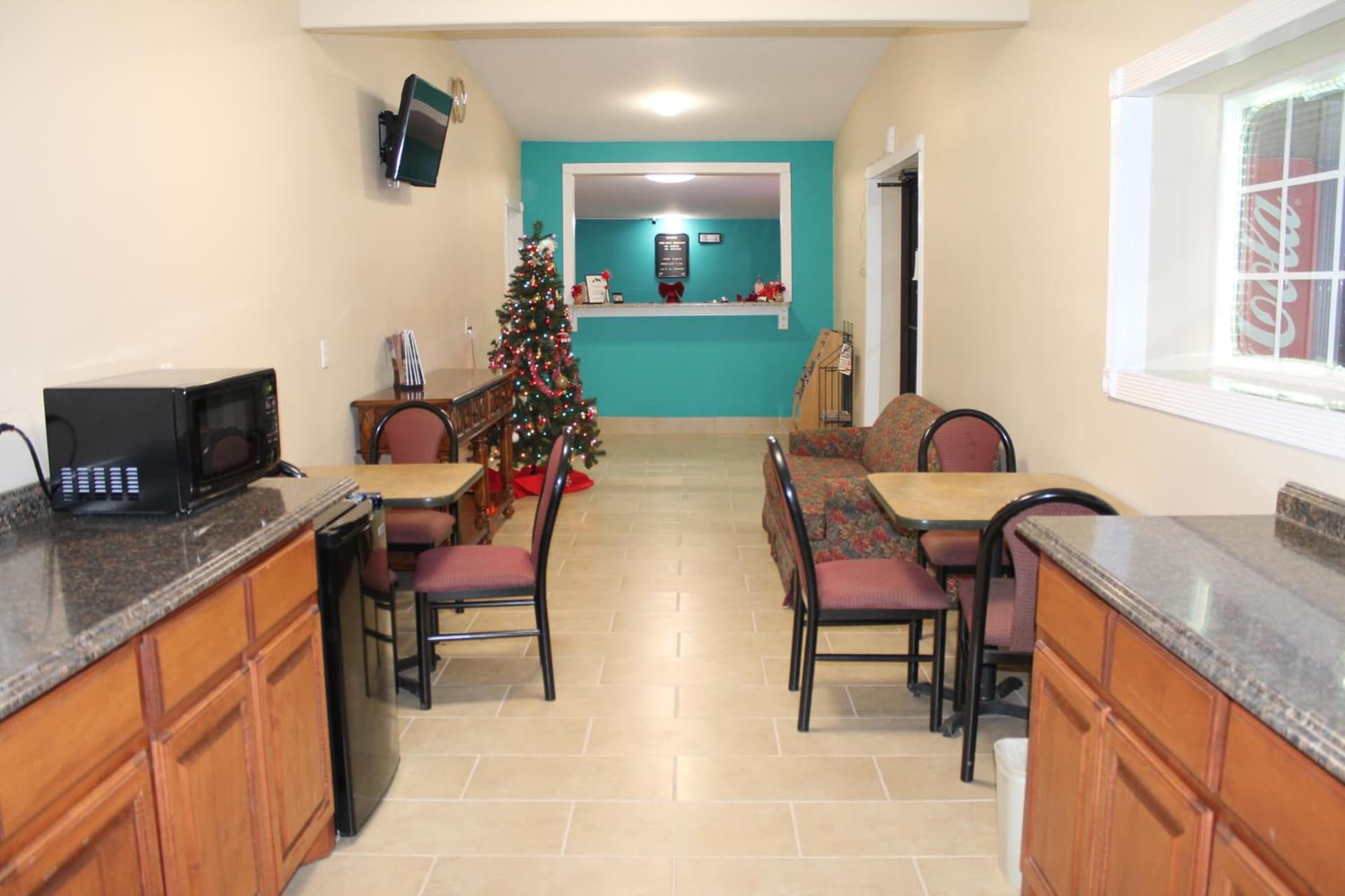 American Inn & Suites featured exterior or lobby in Paris, TX — similar hotel