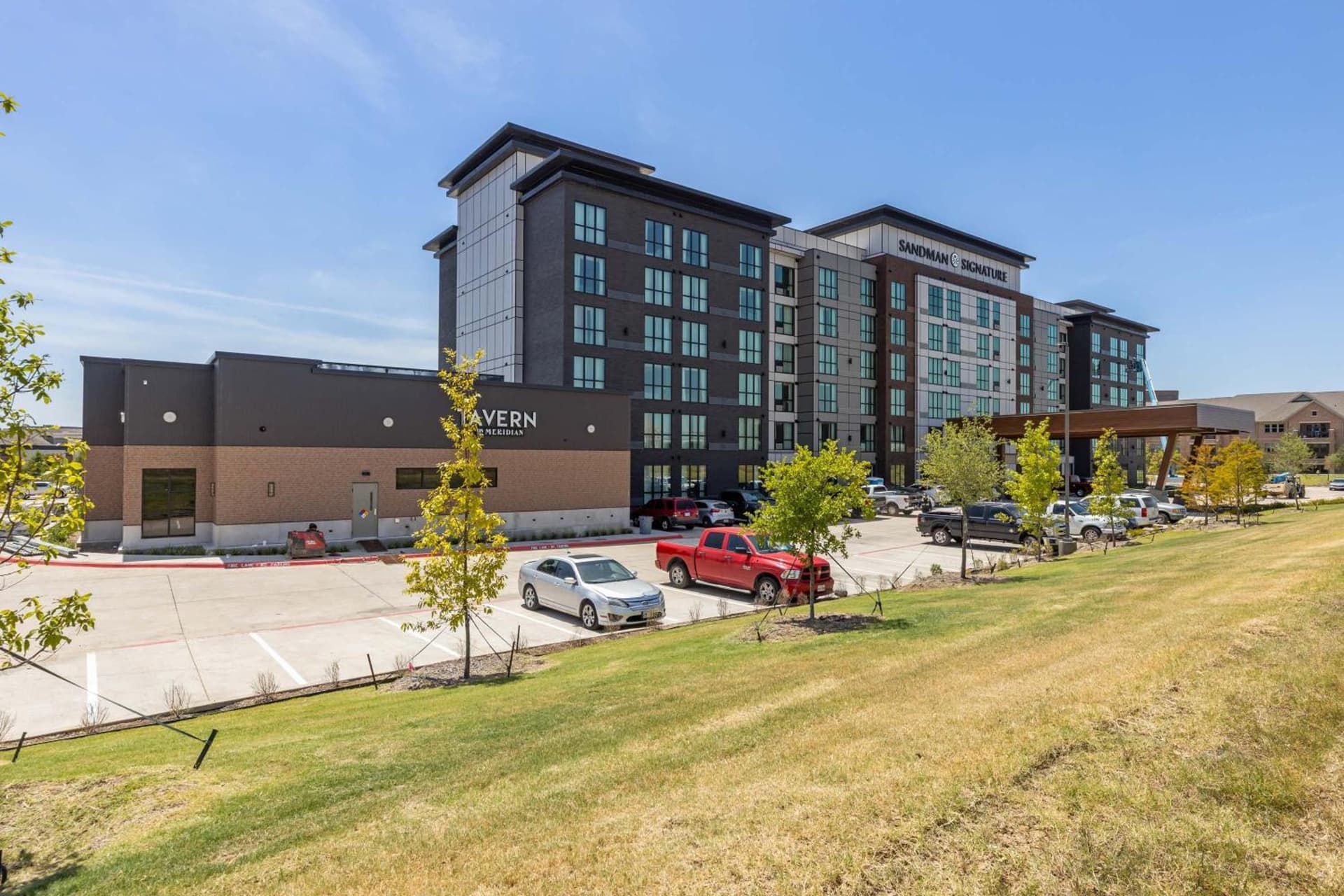 Sandman Signature Dallas Las Colinas Hotel & Suites featured exterior or lobby in Irving, TX — similar hotel