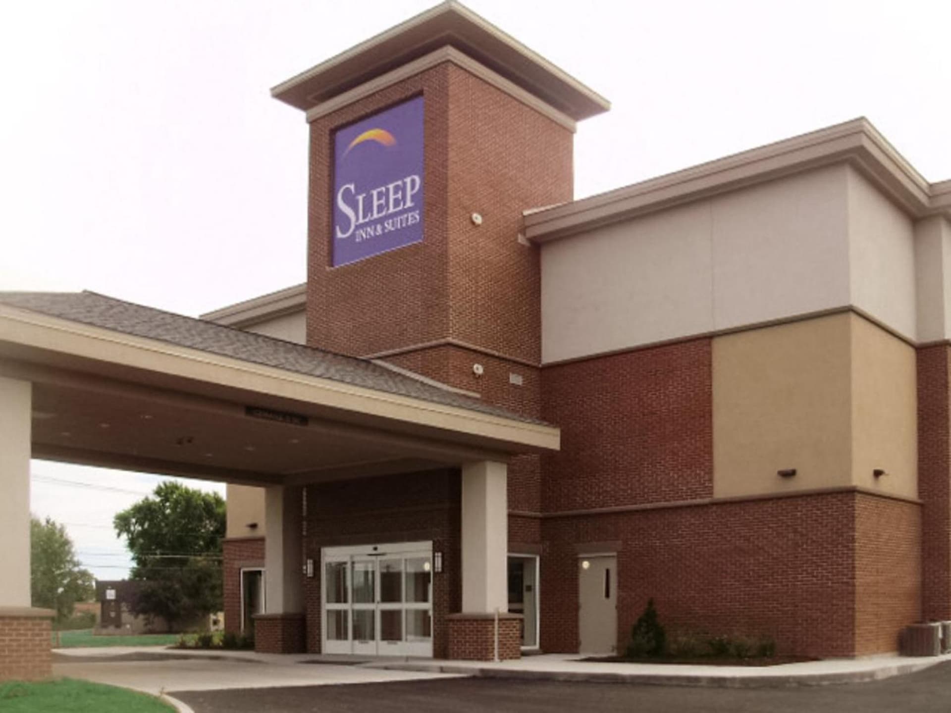 Sleep Inn & Suites Syracuse Airport exterior or lobby in East Syracuse, NY — main listing photo