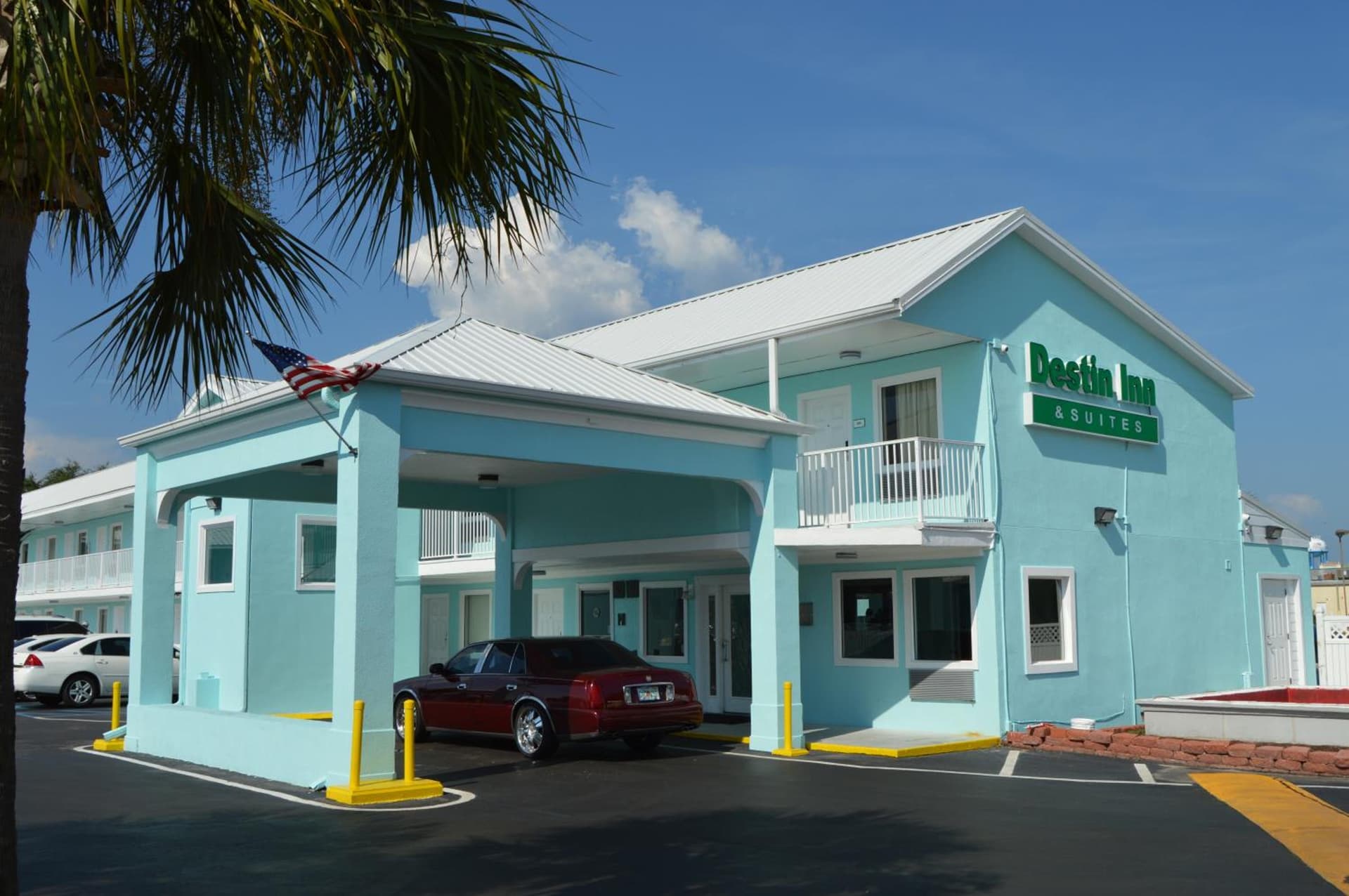 Destin Inn & Suites featured exterior or lobby in Destin, FL — similar hotel