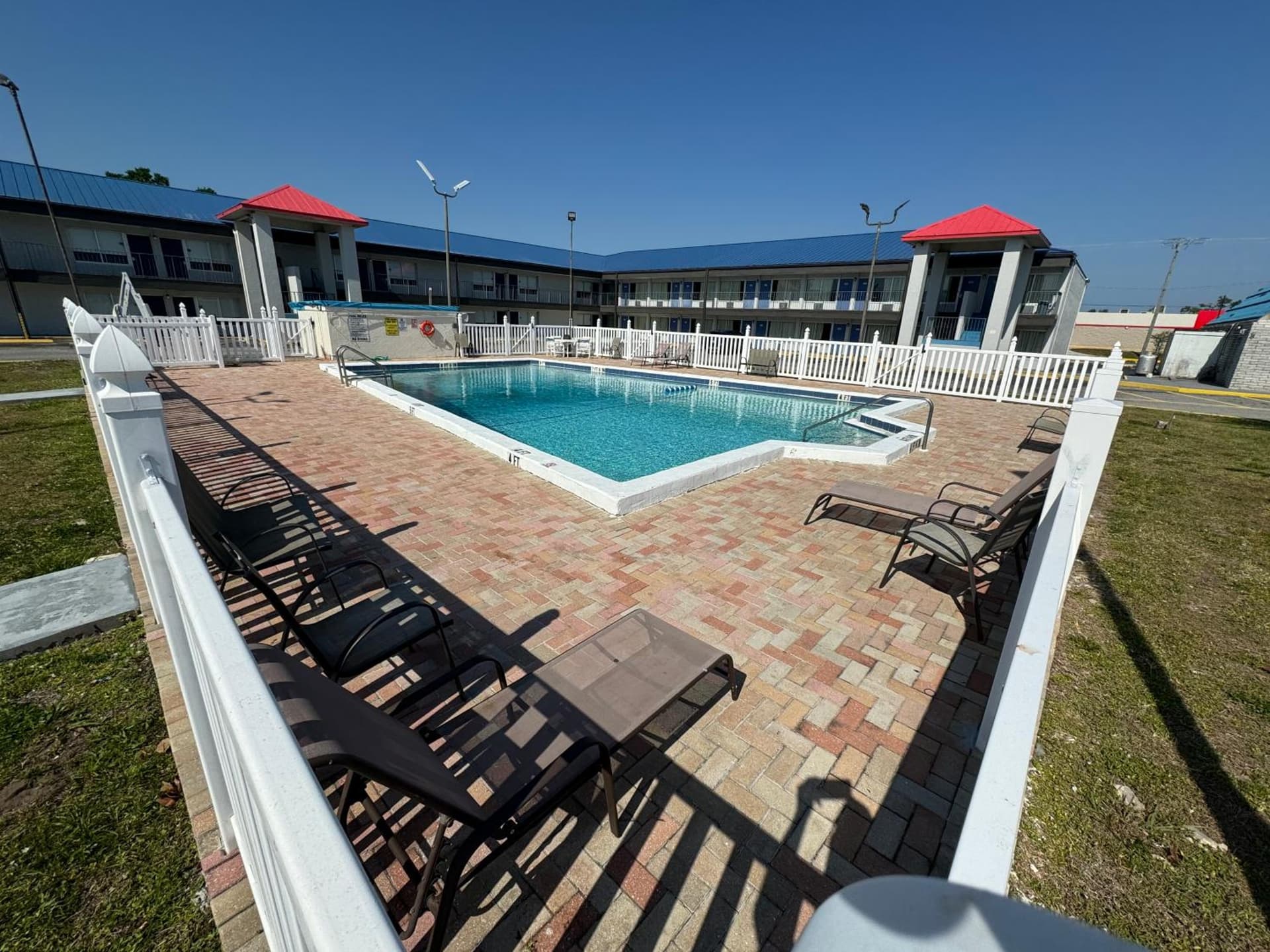 Englewood Inn & Suites featured exterior or lobby in Englewood, FL — similar hotel