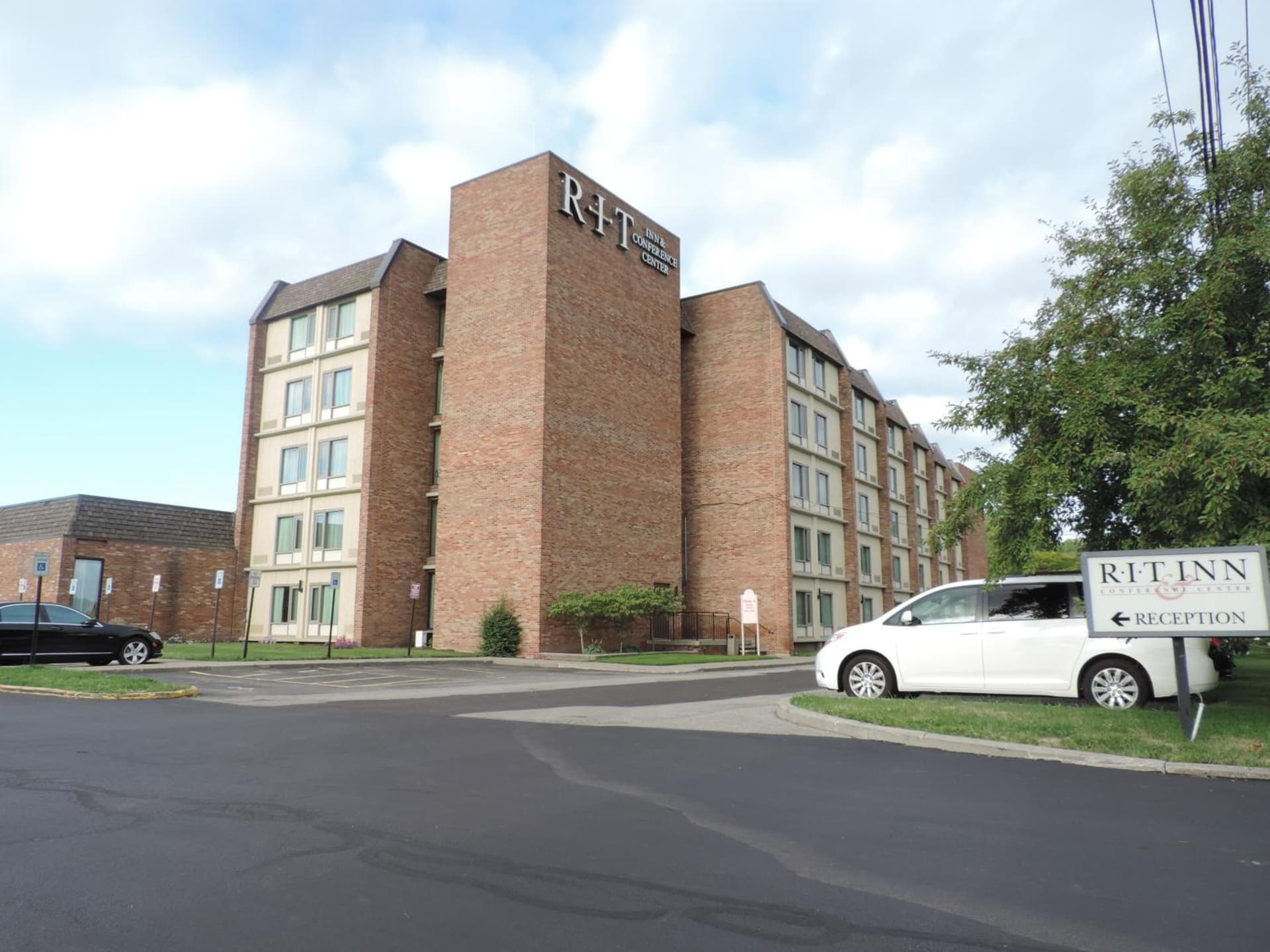 RIT Inn & Conference Center featured exterior or lobby in Henrietta — similar hotel