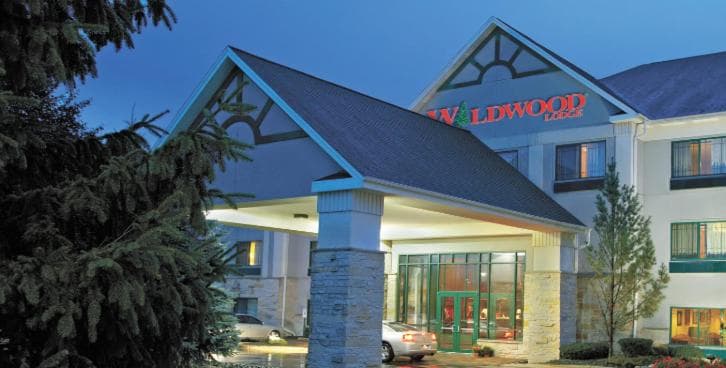 Wildwood Lodge featured exterior or lobby in Pewaukee — similar hotel