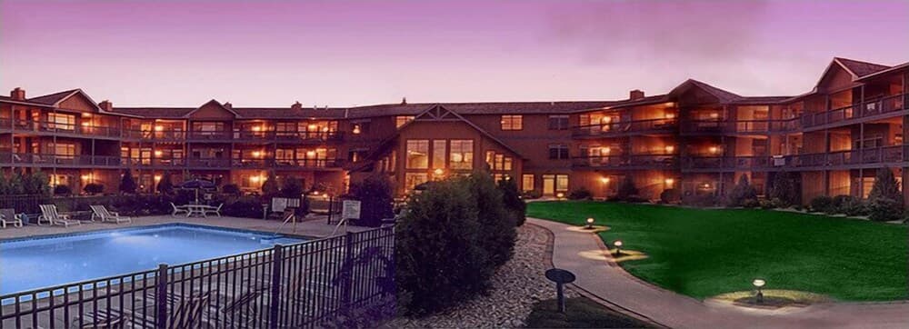 Scandinavian Lodge featured exterior or lobby in Sister Bay, WI — similar hotel