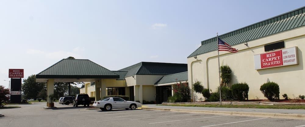 Red Carpet Inn & Suites featured exterior or lobby in Kinston, NC — similar hotel