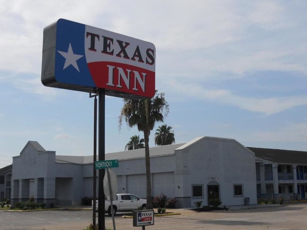 Texas Inn featured exterior or lobby in Rosenberg, TX — similar hotel