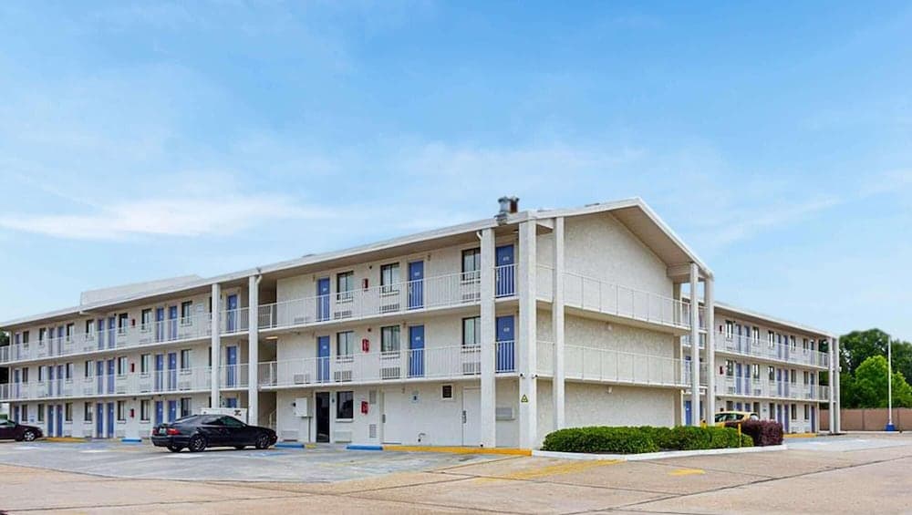Super 6 Inn & Suites Baton Rouge featured exterior or lobby in Baton Rouge, LA — similar hotel