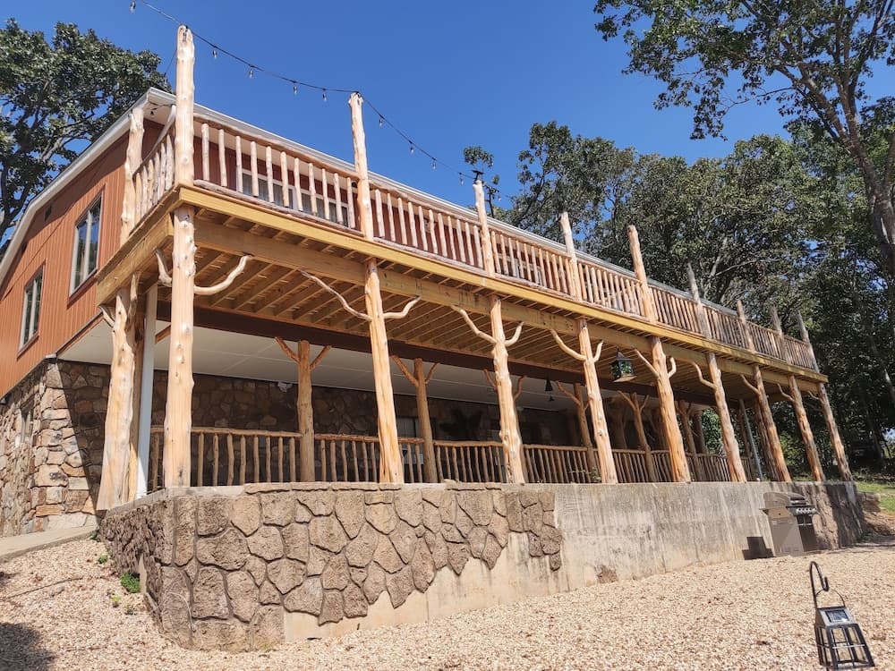 Cedar house featured exterior or lobby in Rockaway Beach, MO — similar hotel