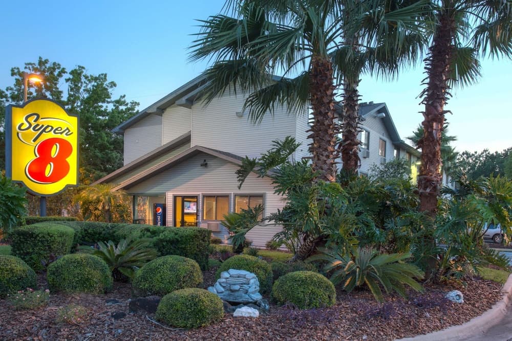 Super 8 by Wyndham Gainesville I-75 Hospital University Area featured exterior or lobby in Gainesville, FL — similar hotel
