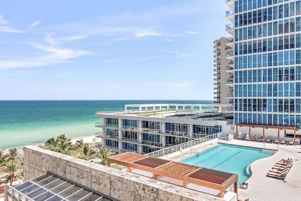 Carillon Miami Wellness Resort exterior or lobby in Miami Beach, FL — main listing photo